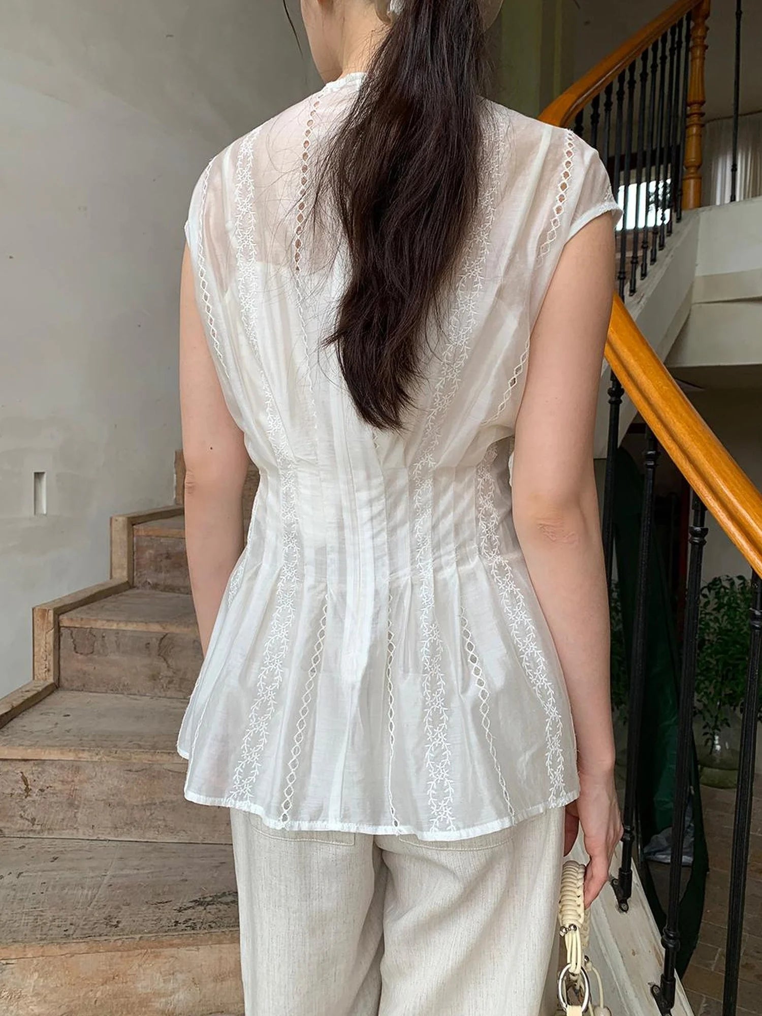 Dorydory Stripe Jacquard Sleeveless Shirt with Waist Cutout