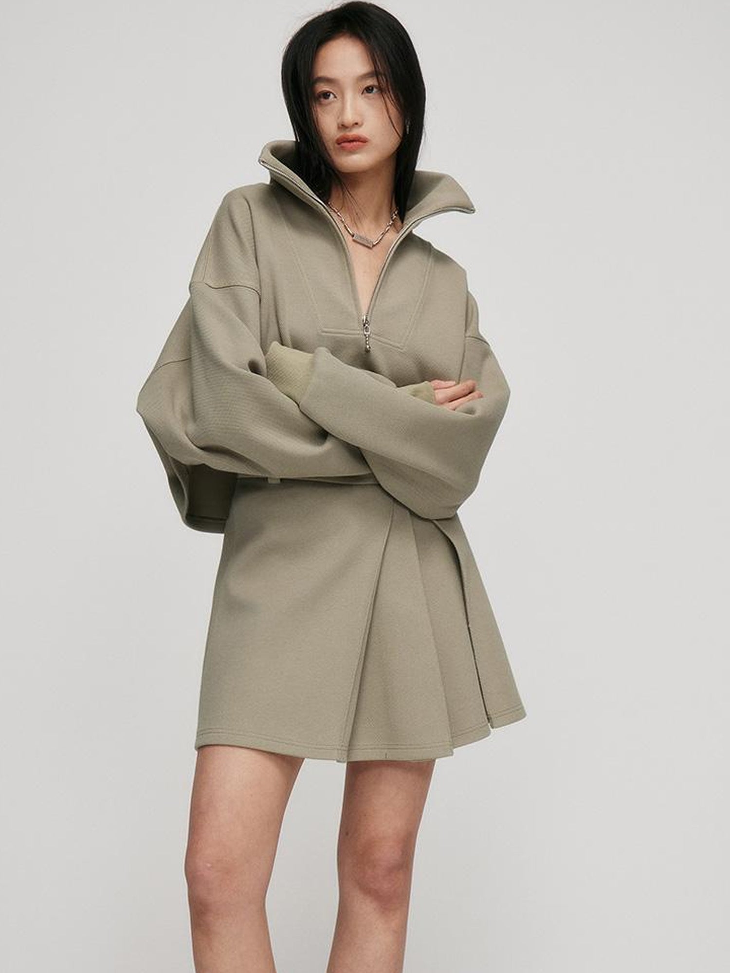 FUSSED A Line Pleated Pique Cotton Skirt In Flax Green