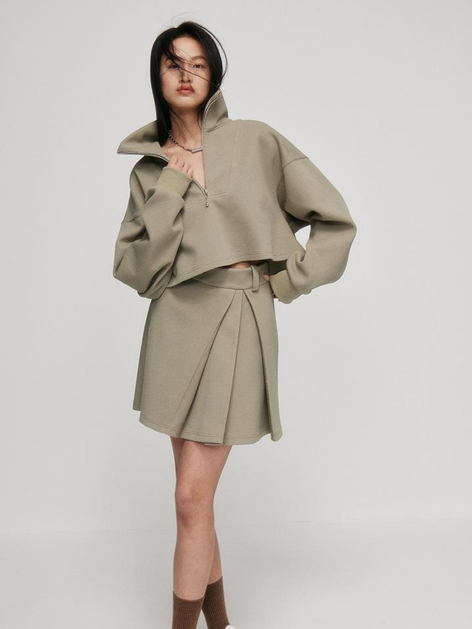 FUSSED A Line Pleated Pique Cotton Skirt In Flax Green
