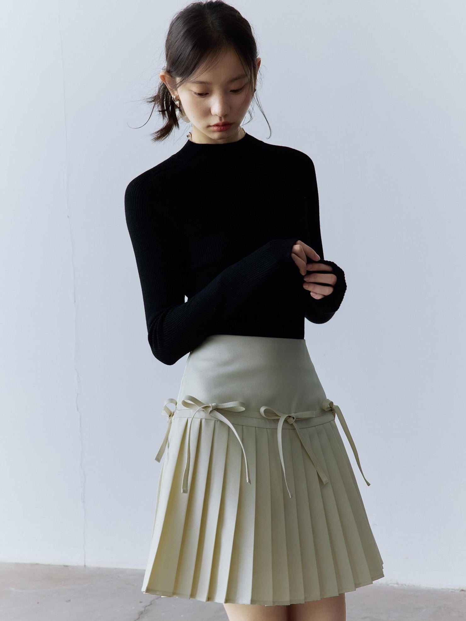 FUSSED High Waist Pleated Preppy Side Zipper 3D Bow Off White Mini Skirt