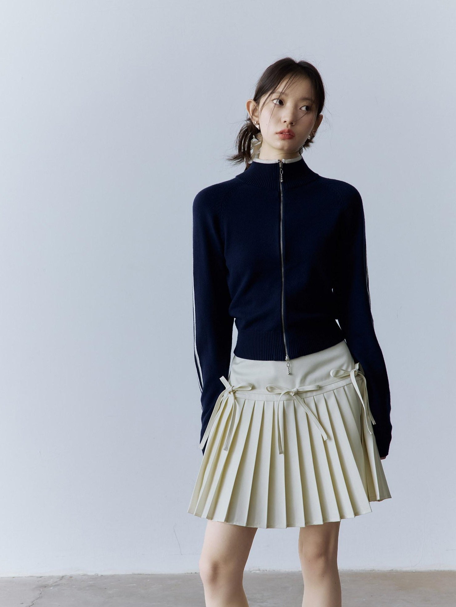 FUSSED High Waist Pleated Preppy Side Zipper 3D Bow Off White Mini Skirt