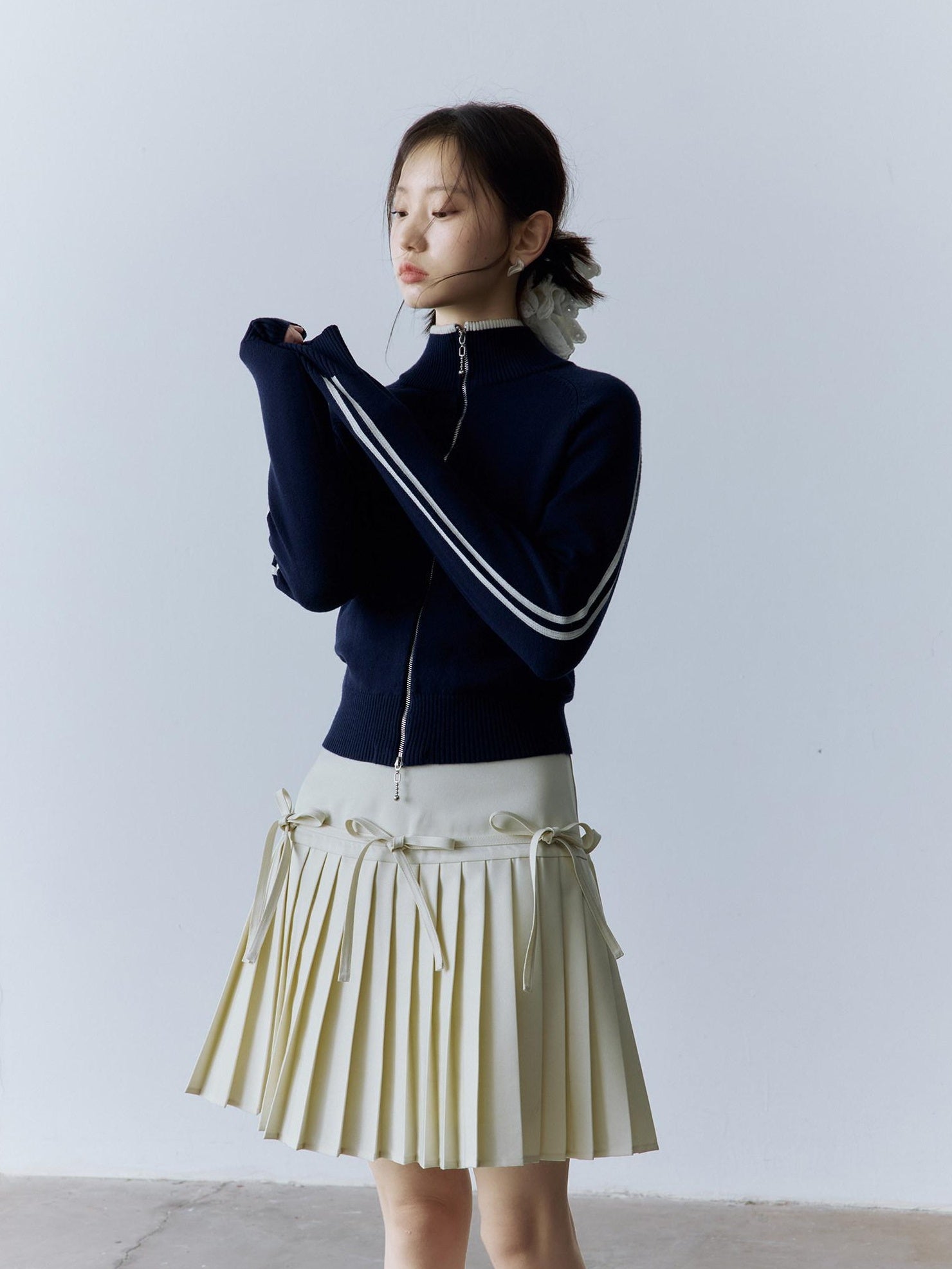 FUSSED High Waist Pleated Preppy Side Zipper 3D Bow Off White Mini Skirt