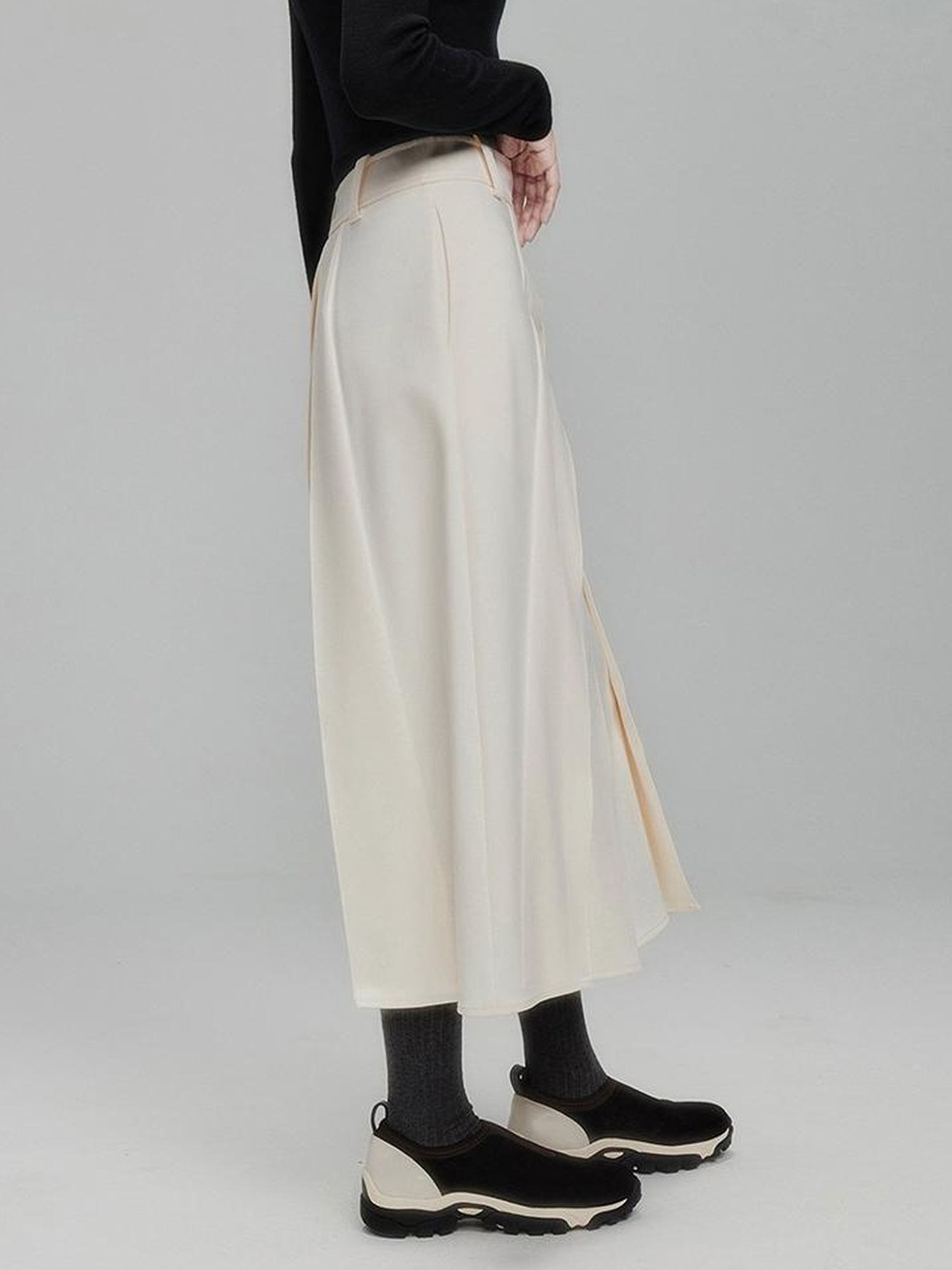 FUSSED Infinite White Pleated Midi Skirt With Asymmetric Hem