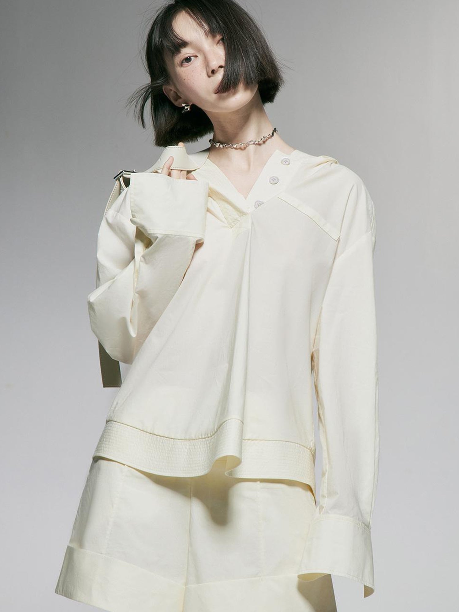 FUSSED Ivory Cotton Wide Leg Shorts With Pleats And Cuffed Hem