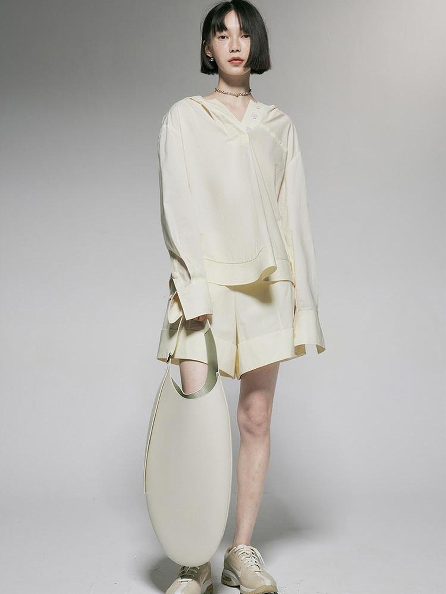 FUSSED Ivory Cotton Wide Leg Shorts With Pleats And Cuffed Hem