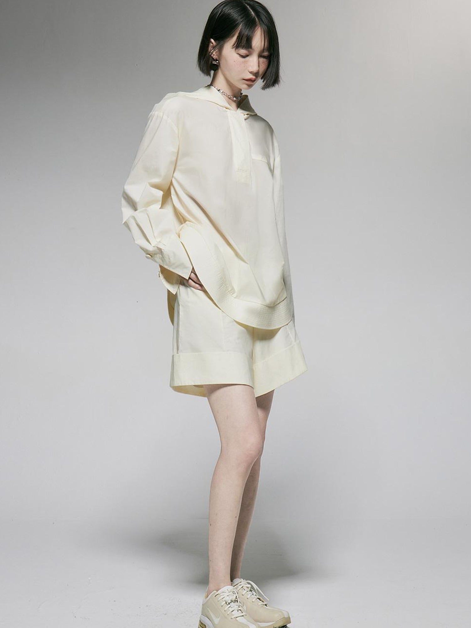 FUSSED Ivory Cotton Wide Leg Shorts With Pleats And Cuffed Hem