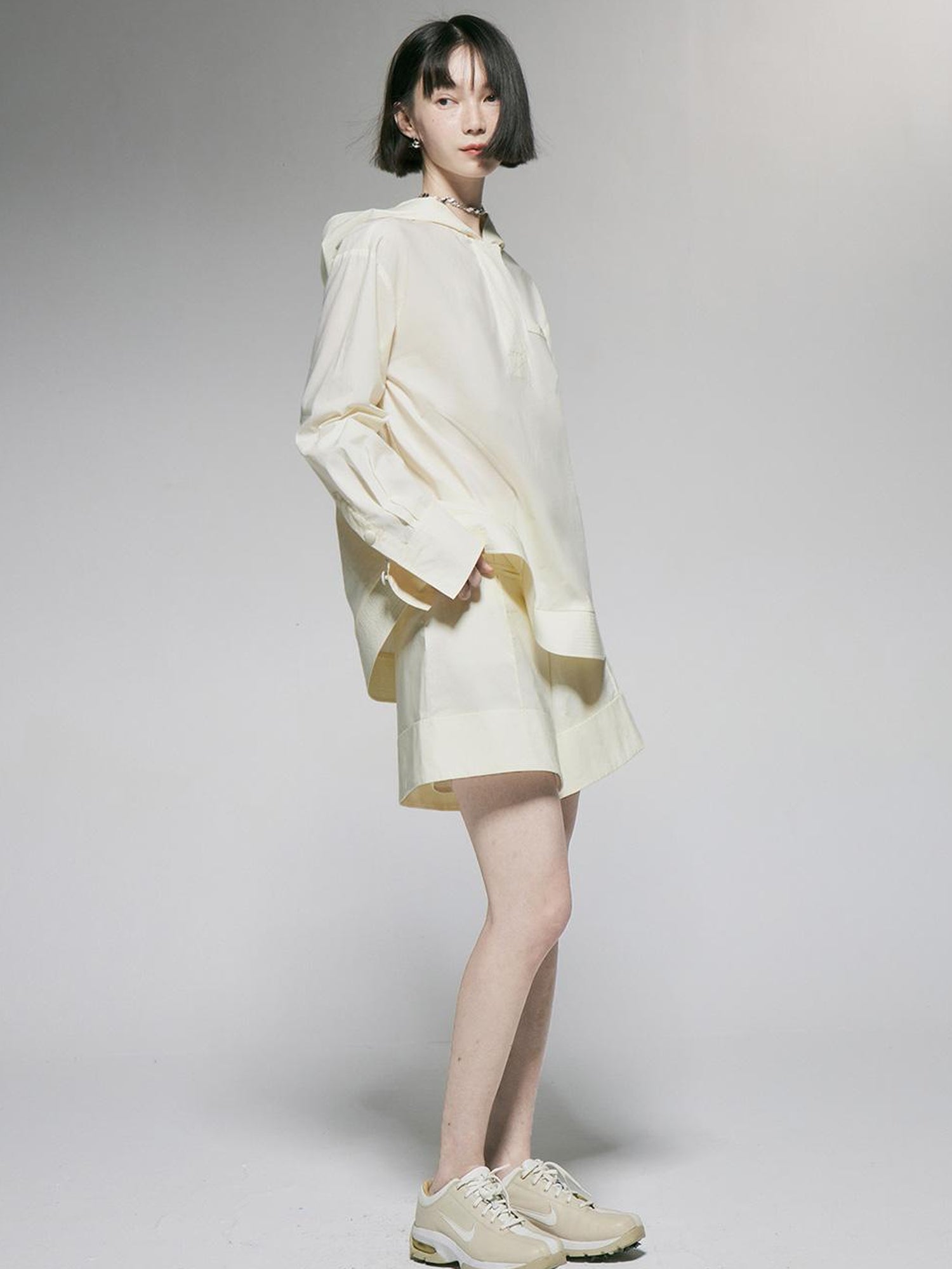 FUSSED Ivory Cotton Wide Leg Shorts With Pleats And Cuffed Hem