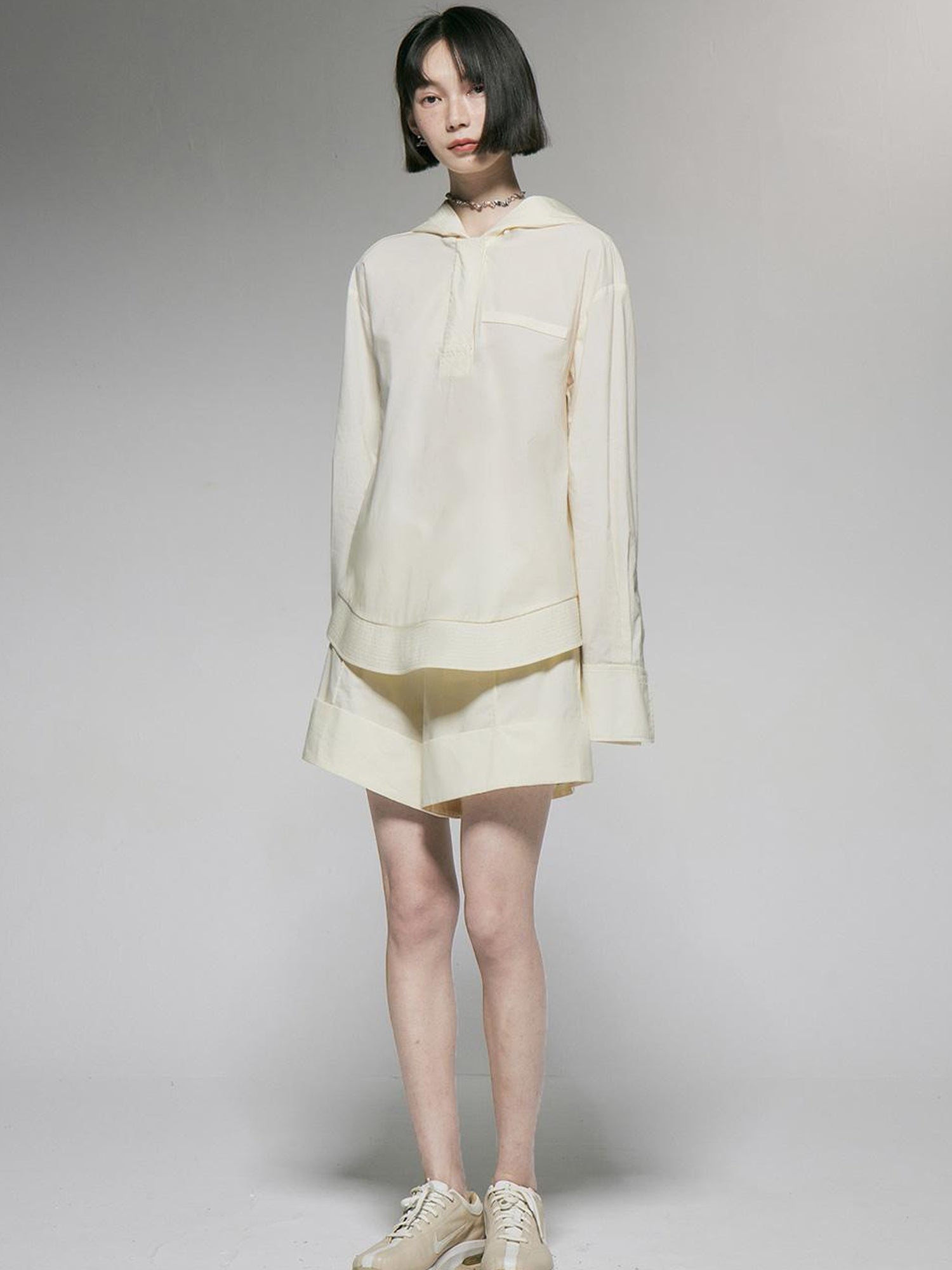 FUSSED Ivory Cotton Wide Leg Shorts With Pleats And Cuffed Hem