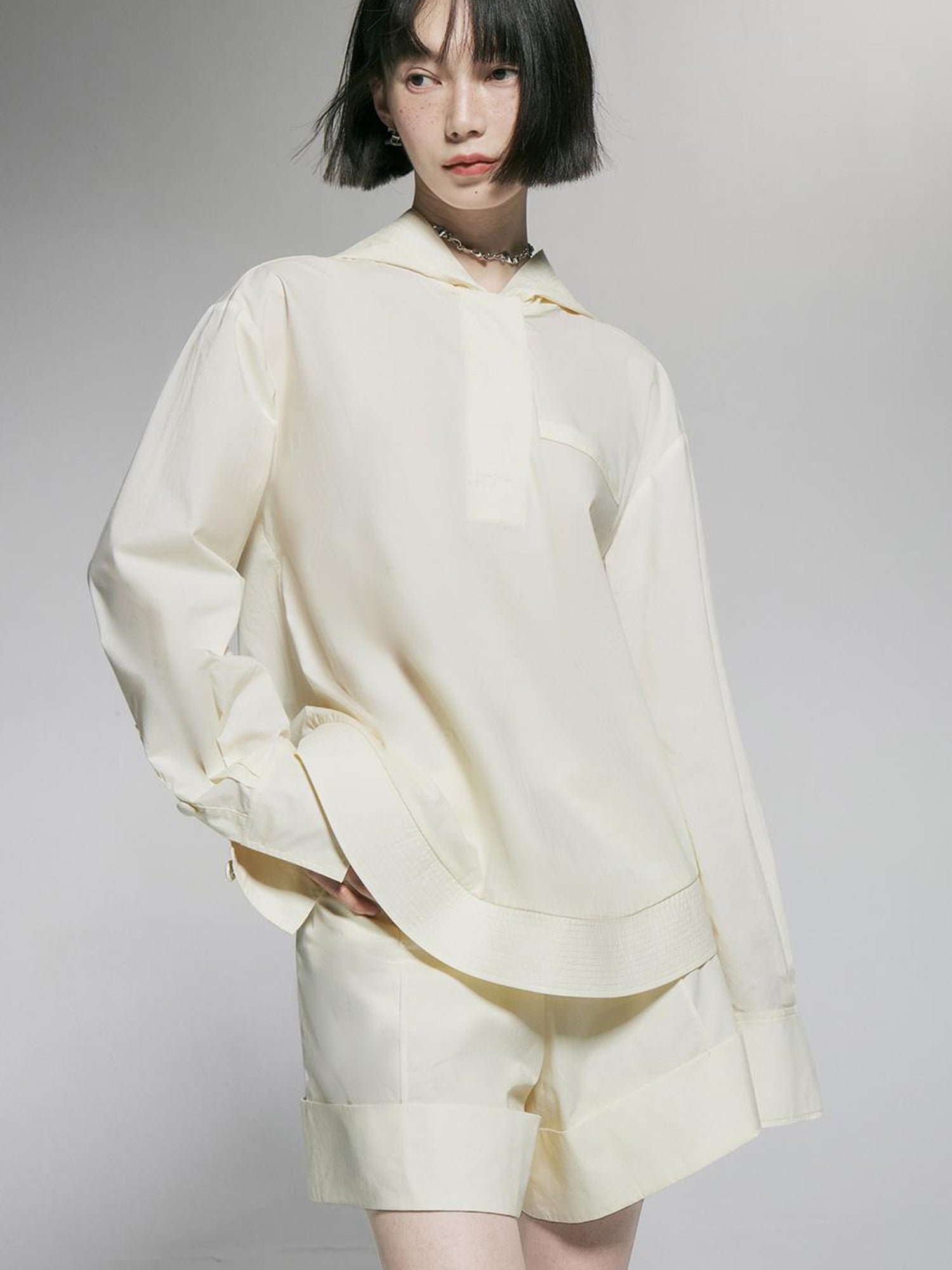 FUSSED Ivory Cotton Wide Leg Shorts With Pleats And Cuffed Hem