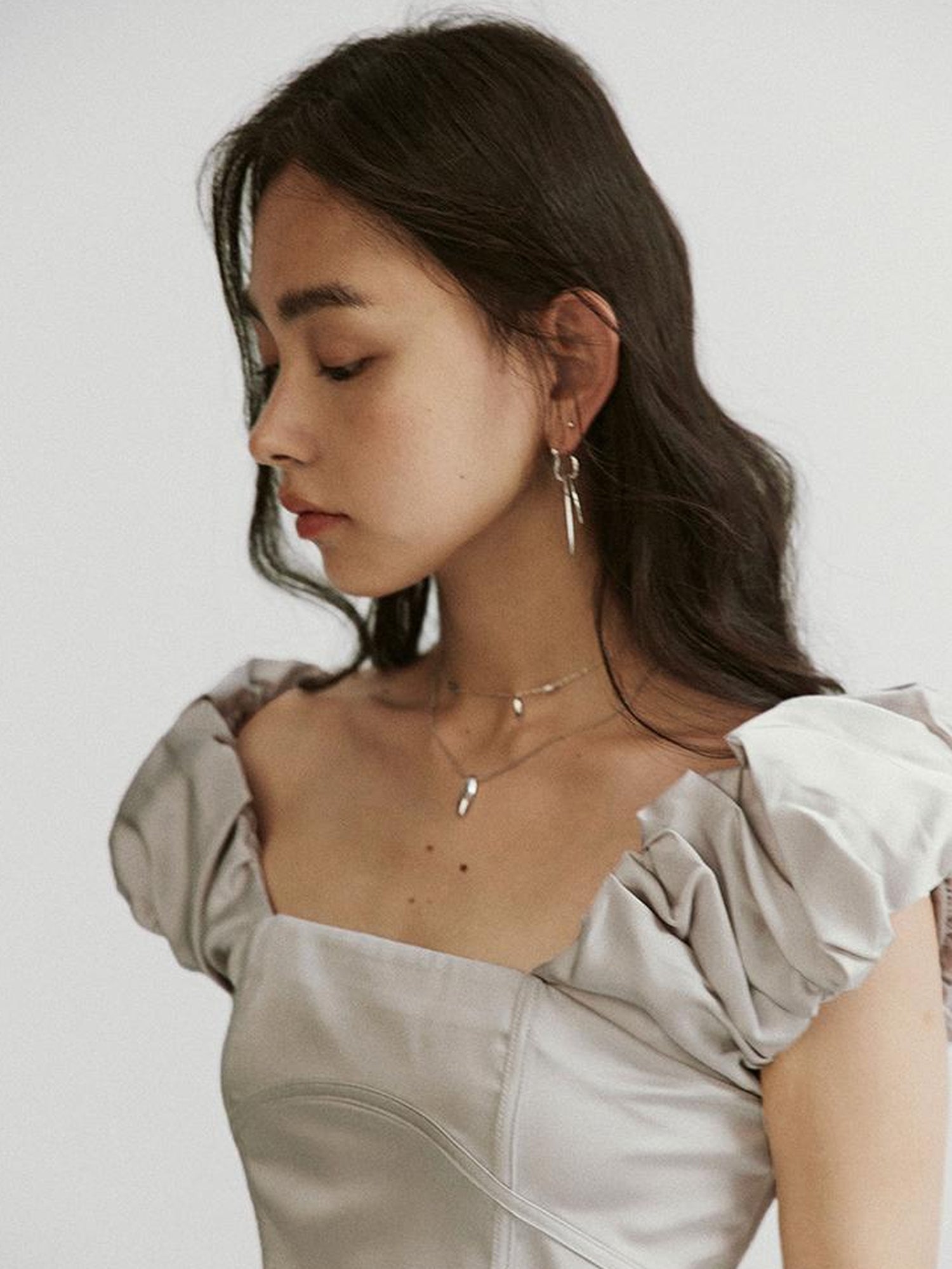 FUSSED Metallic Silver Bubble Cloud Puff Sleeve Crop Top V-neck A Line Skirt Set
