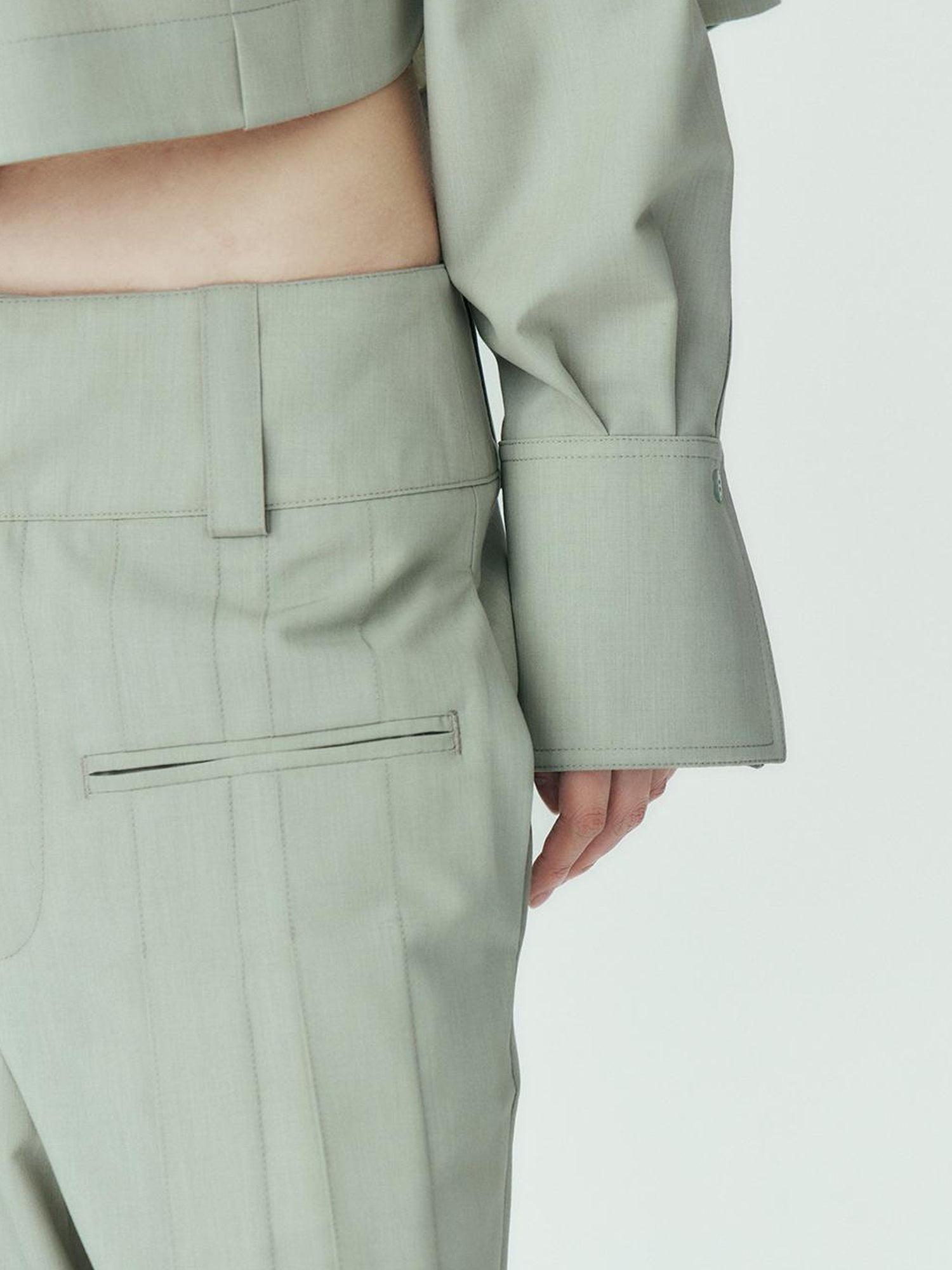 FUSSED Mint Green Pleated Wide Leg Trousers With Double Fold Design