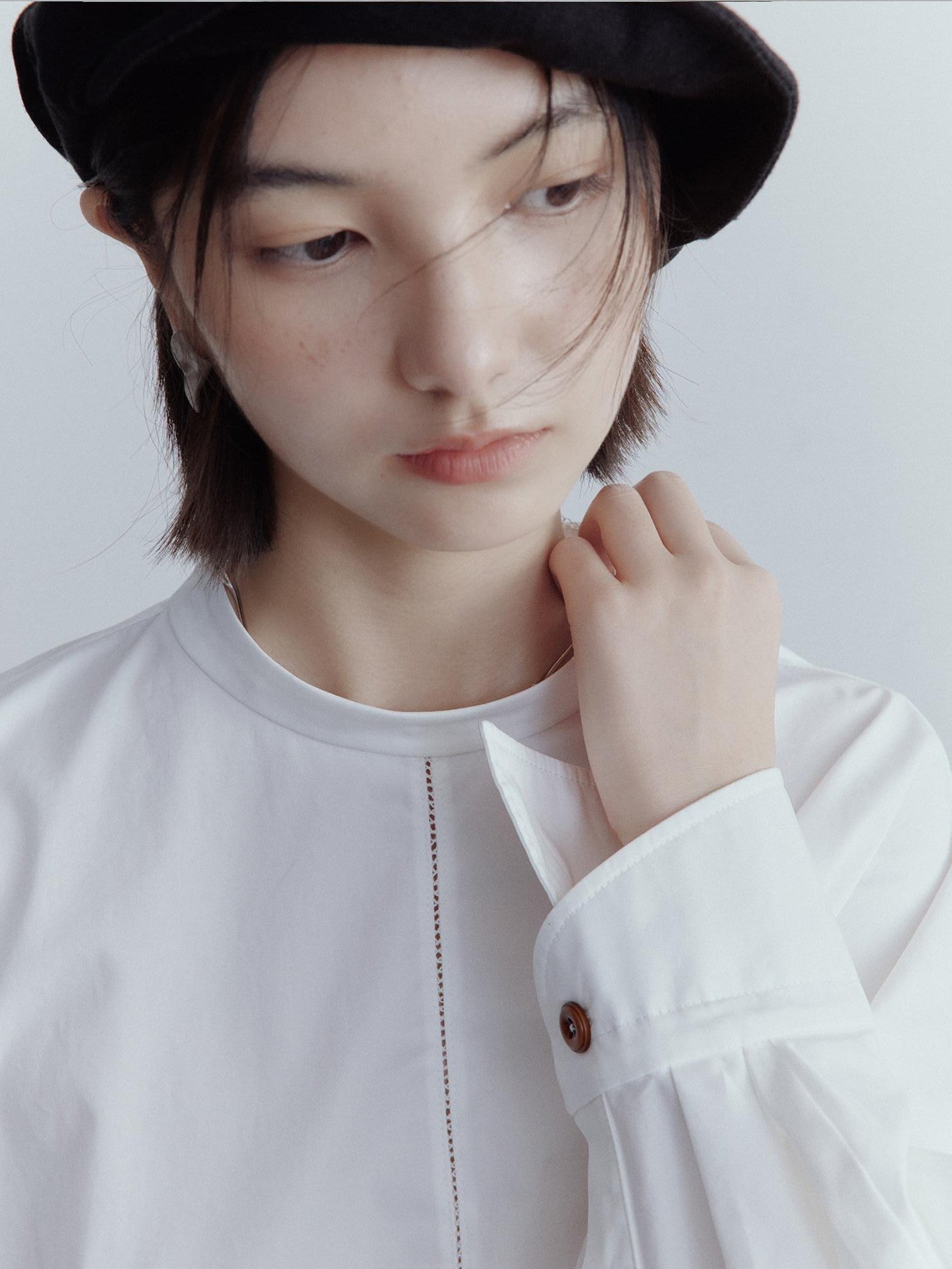 FUSSED Mist White Oversized Asymmetric Sleeve Cutout Splice Women&