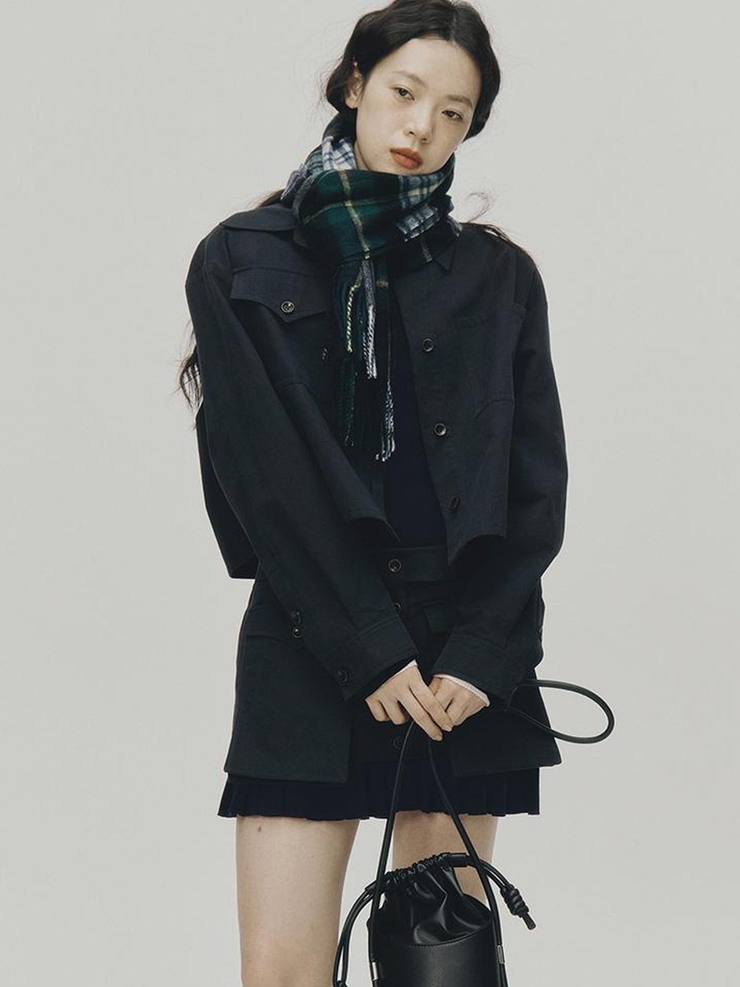 FUSSED Structured Pleated Mini Skirt With Asymmetric Pocket In Dusk Blue