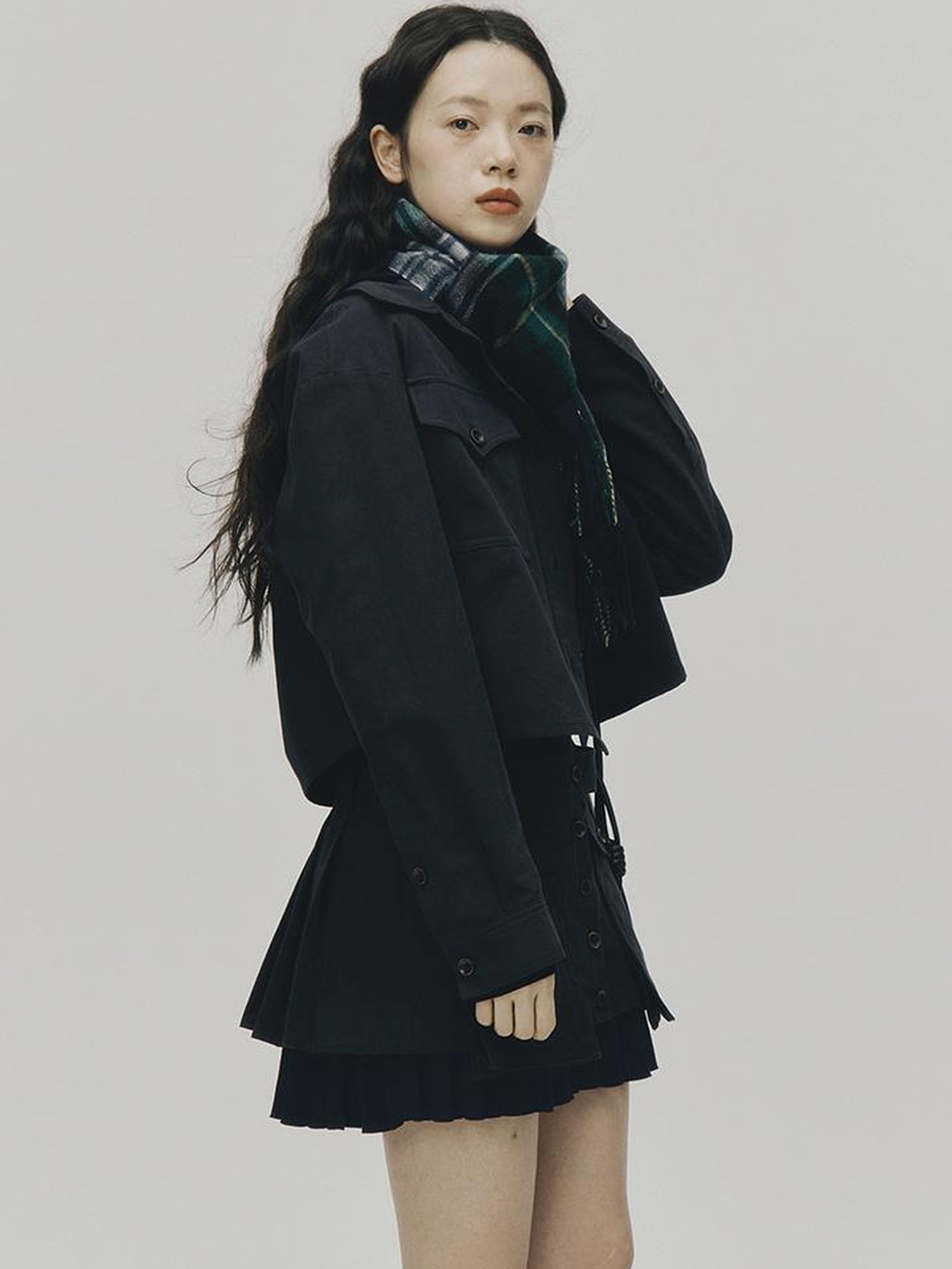 FUSSED Structured Pleated Mini Skirt With Asymmetric Pocket In Dusk Blue