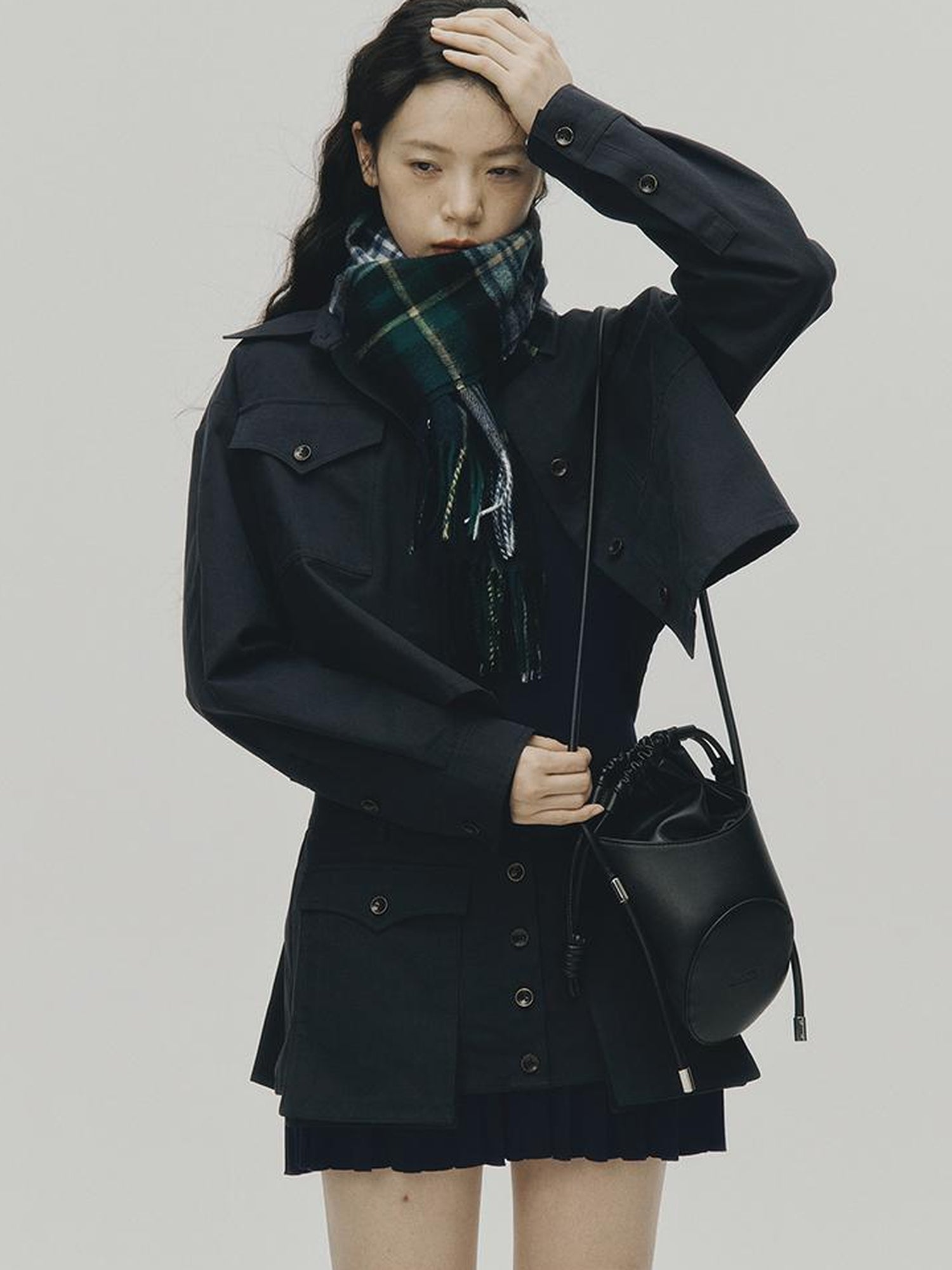 FUSSED Structured Pleated Mini Skirt With Asymmetric Pocket In Dusk Blue