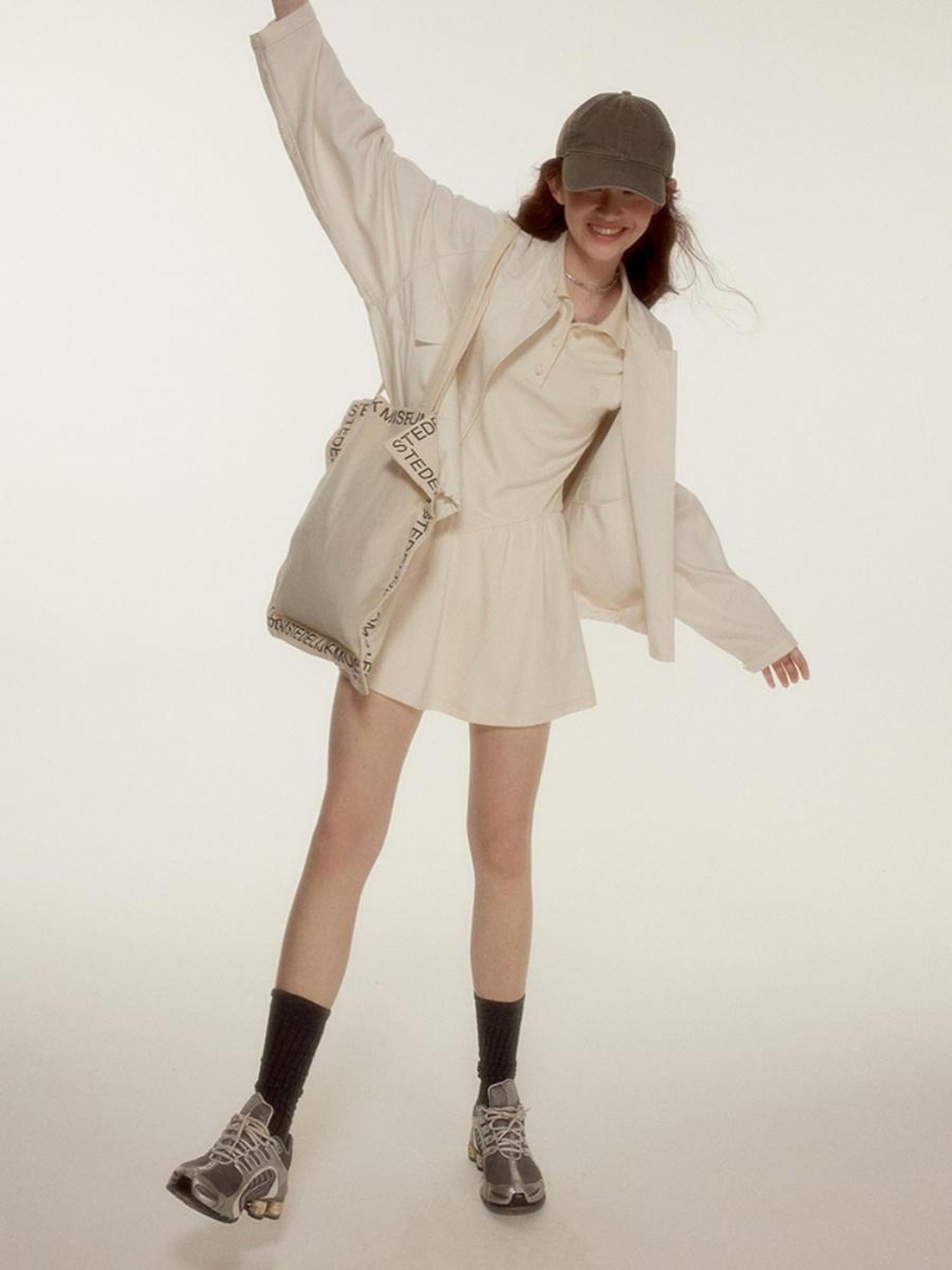 FUSSED Tennis Bow Embroidered Mockneck Dress