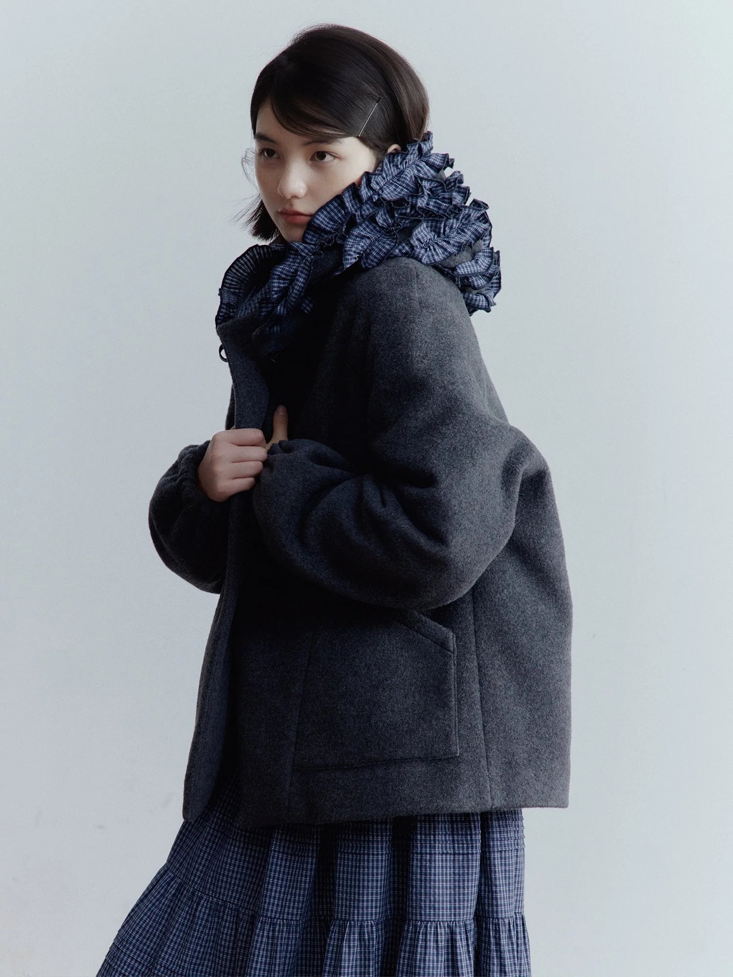 FUSSED_Wool_Blend_Hooded_Coat_with_Layered_Ruffle_Trim_and_Patch_Pockets_MISSTT