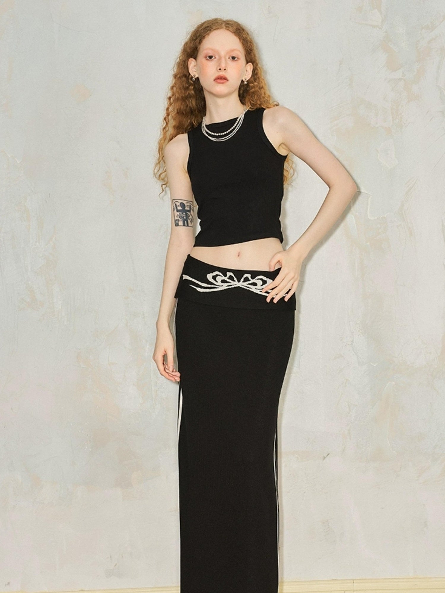 DIDDI MODA Flip Waist Bow Jacquard Knit Skirt
