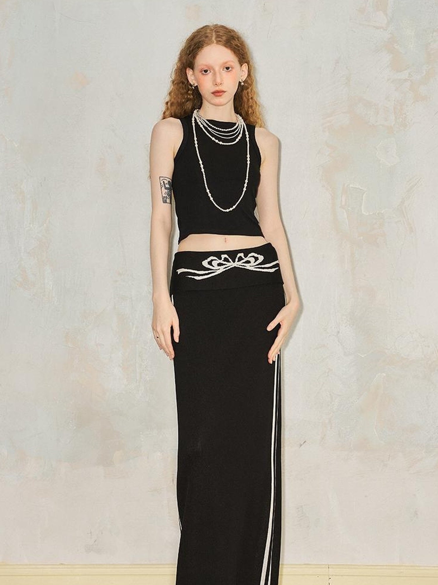 DIDDI MODA Flip Waist Bow Jacquard Knit Skirt