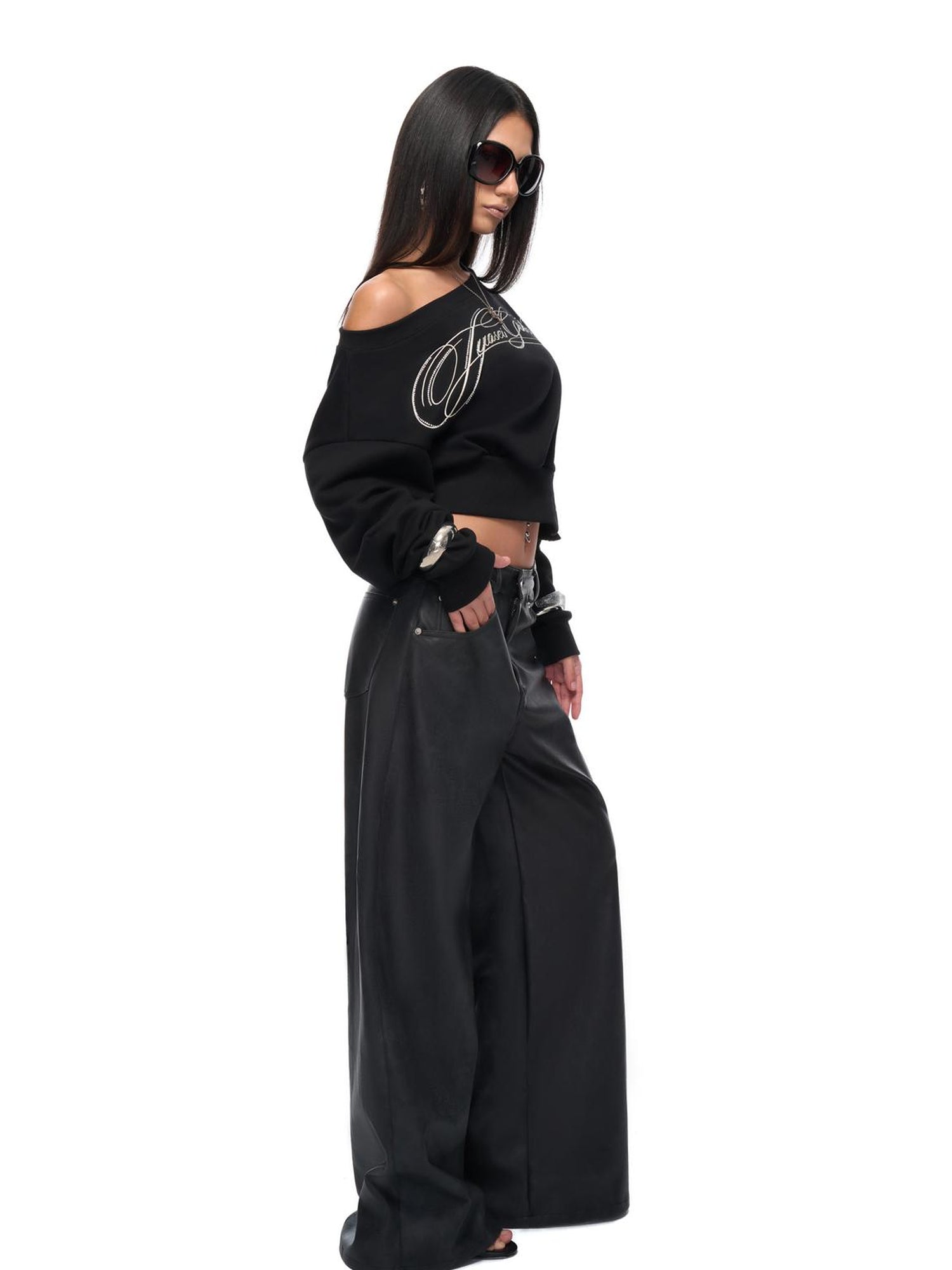 JYOSEI Off Shoulder Embroidered Crop Hoodie with Wide Leg Low Rise Leather Pants Set