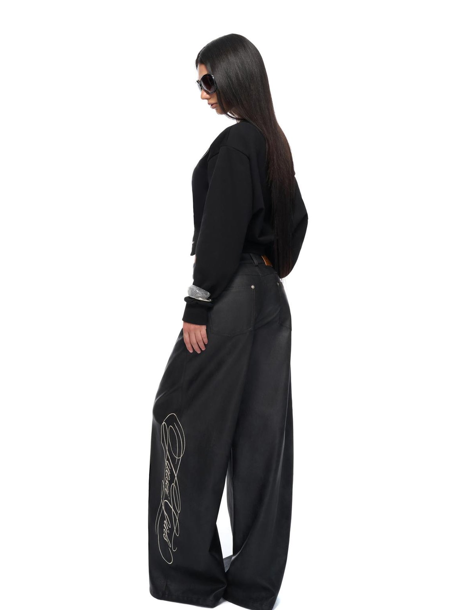 JYOSEI Off Shoulder Embroidered Crop Hoodie with Wide Leg Low Rise Leather Pants Set