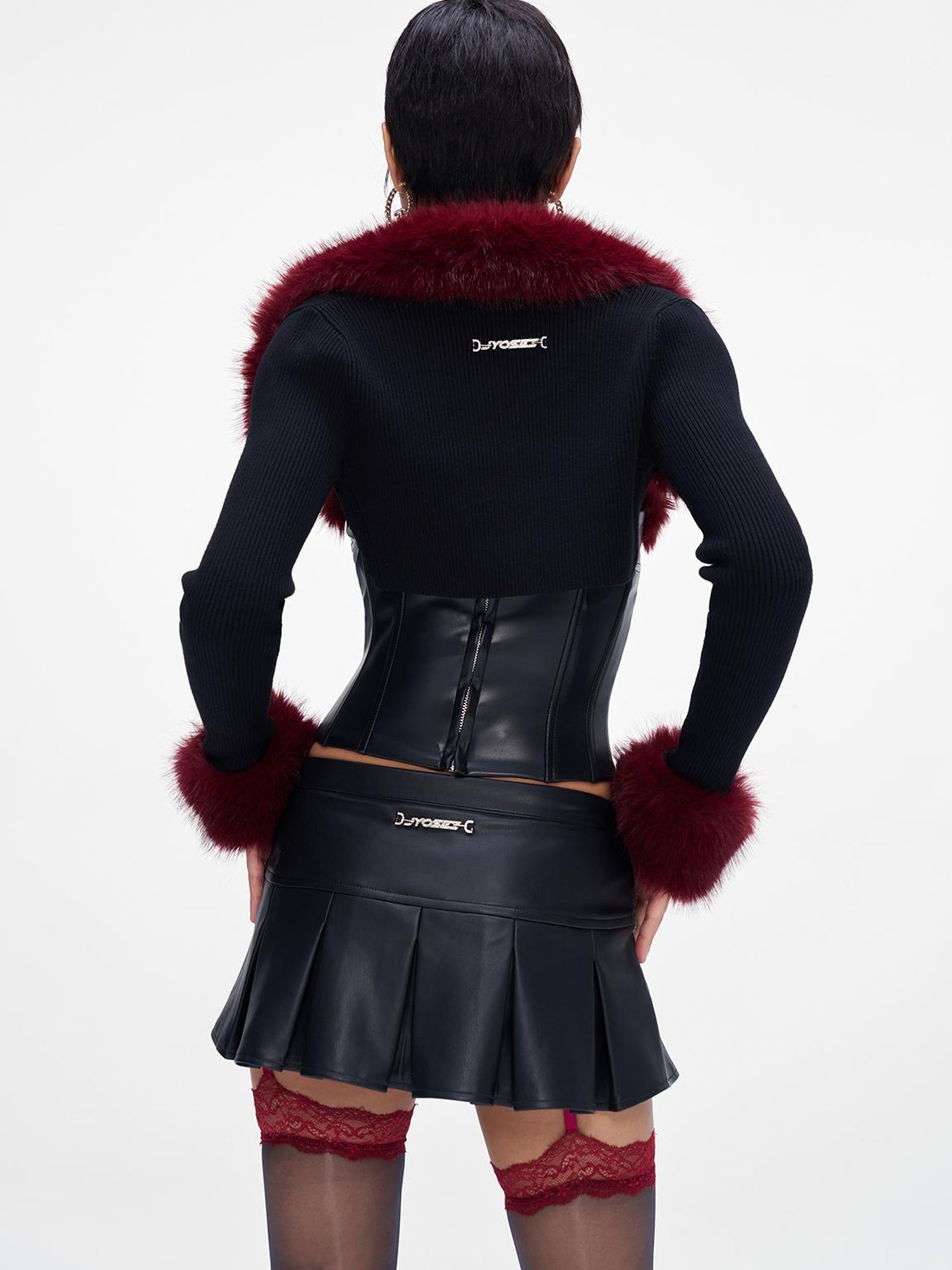 JYOSEI P U Mini Skirt with Eyelet Pin Detail Low Waist Stretch Leather