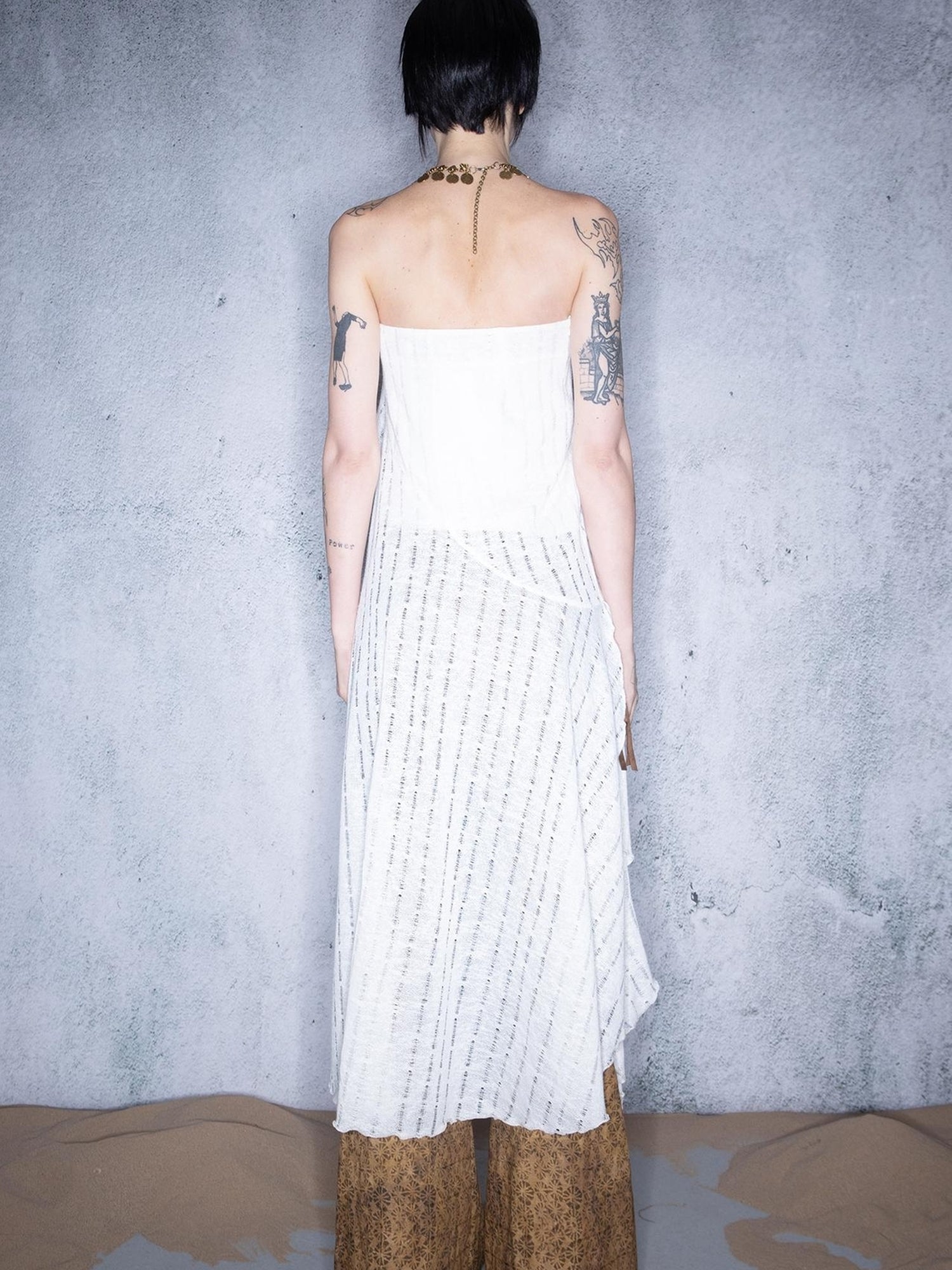 UpdateNN NORTH NODE Dance Of Sand Grains Asymmetric Hem Knit Skirt