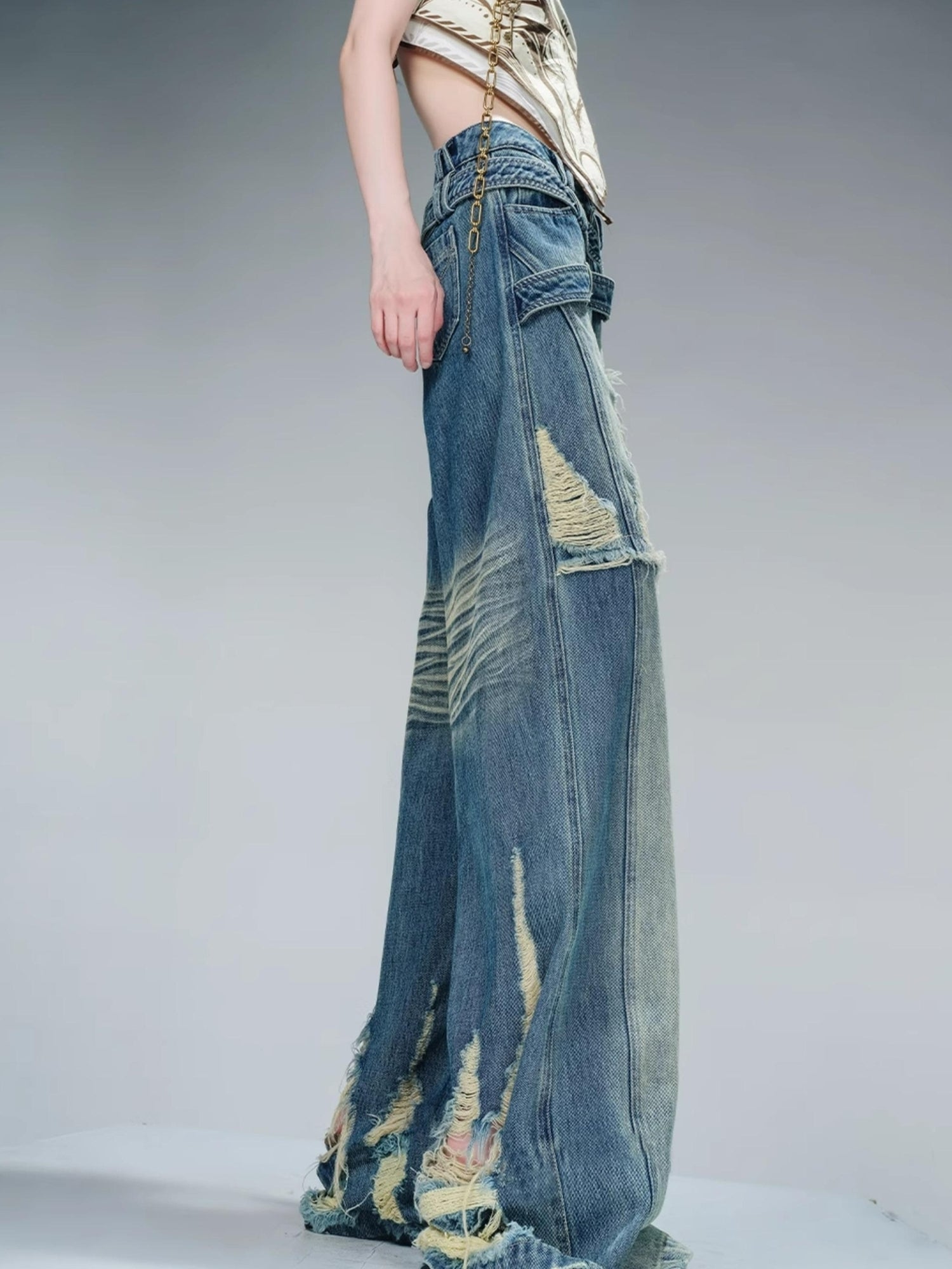 NN NORTH NODE Distressed Pulled Denim Jeans With Ripped Details