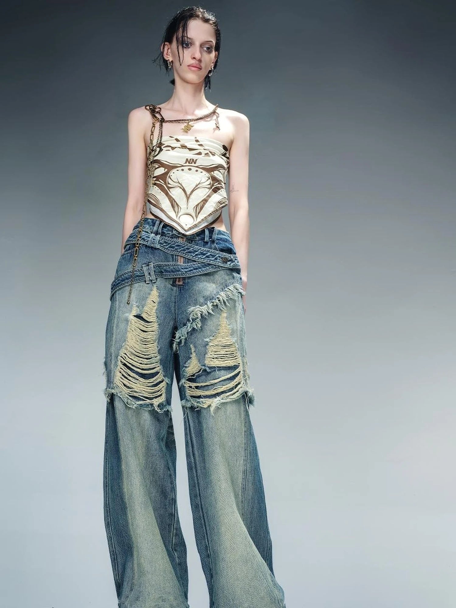 Distressed Pulled Denim Jeans With Ripped Details