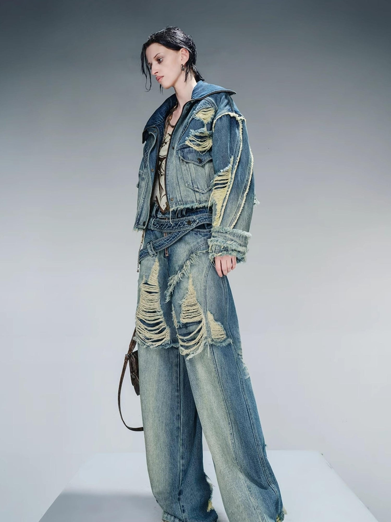 NN NORTH NODE Distressed Pulled Denim Jeans With Ripped Details