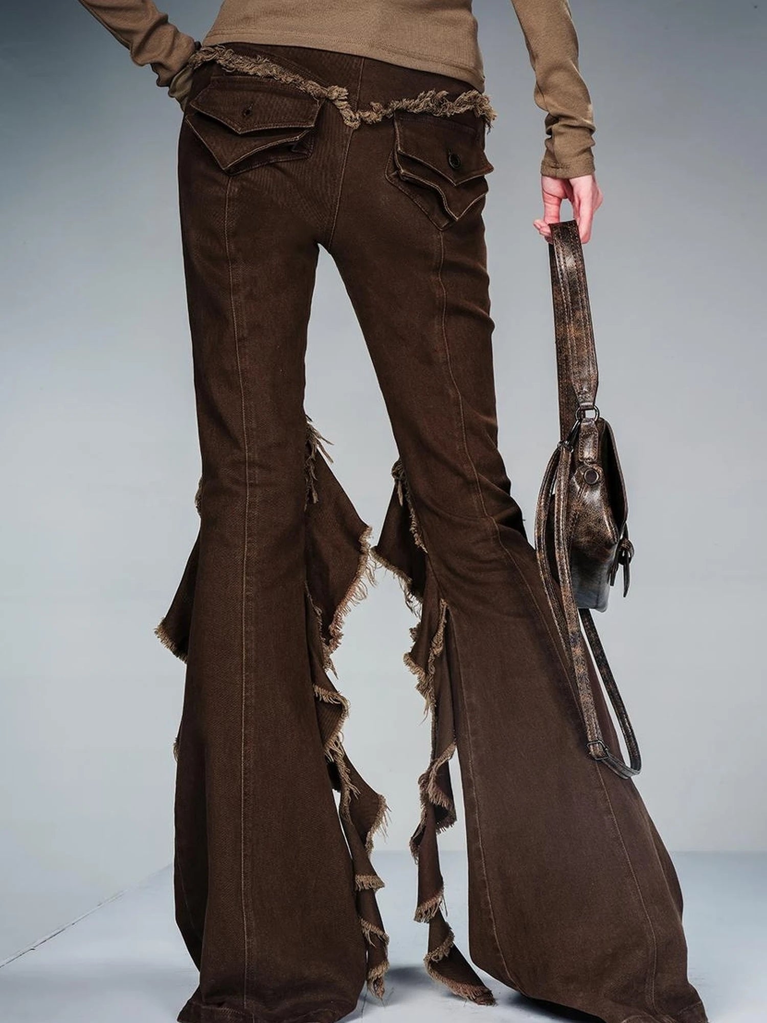 Flared Denim Pants With Asymmetrical Hem