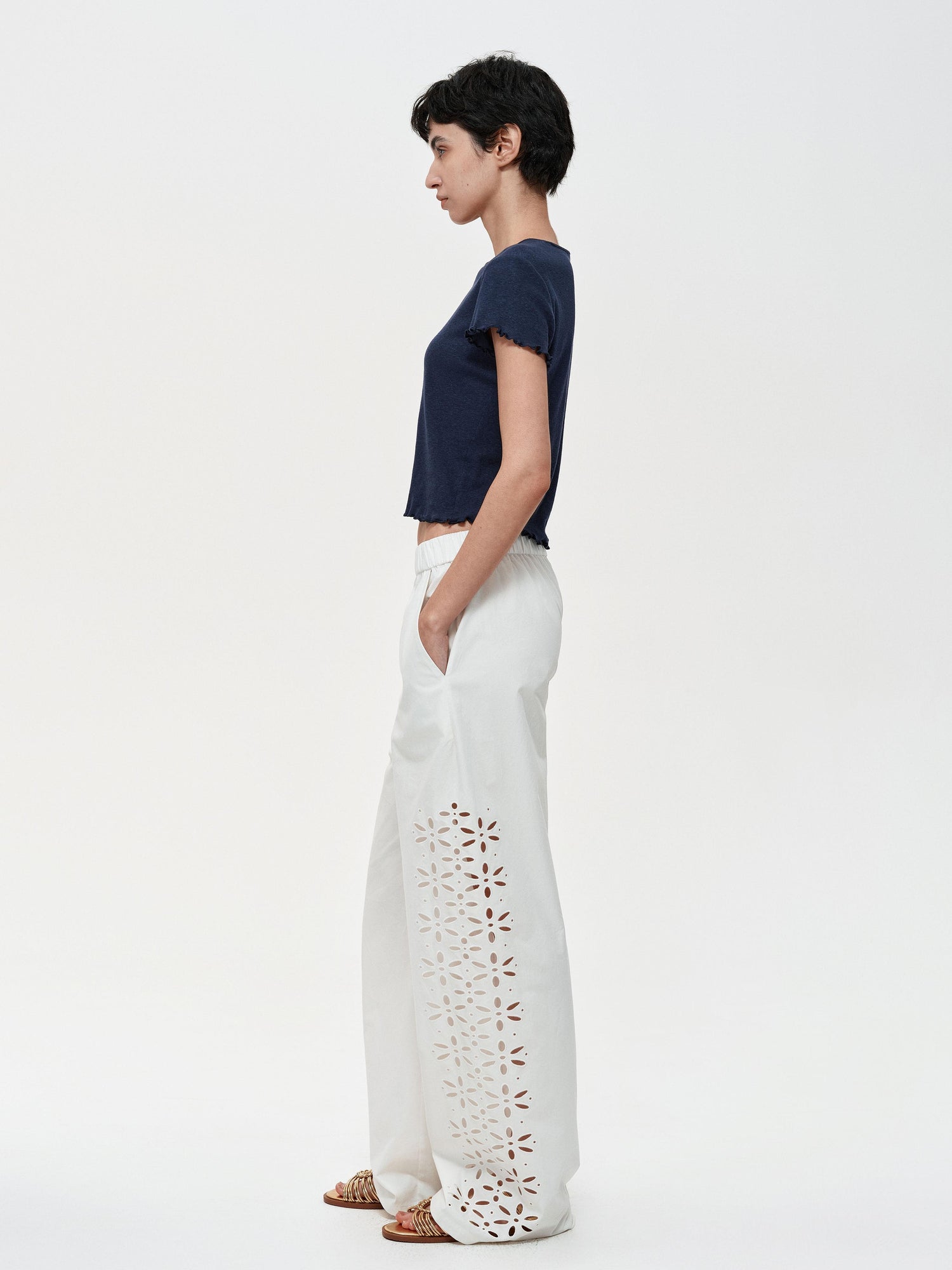 Northbutsouth Laser-Cut Hollow-Out Straight-Leg Pants In Black And White