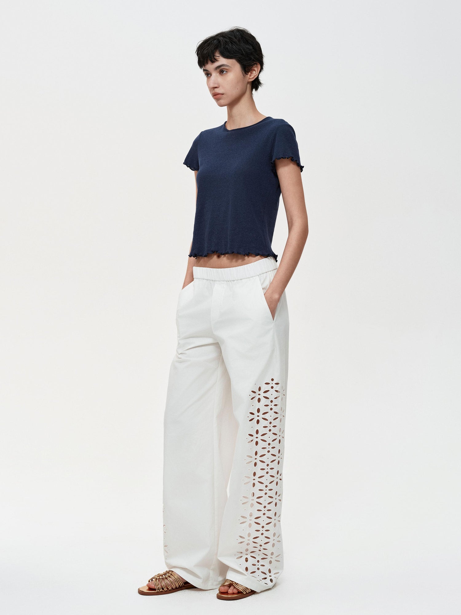 Northbutsouth Laser-Cut Hollow-Out Straight-Leg Pants In Black And White