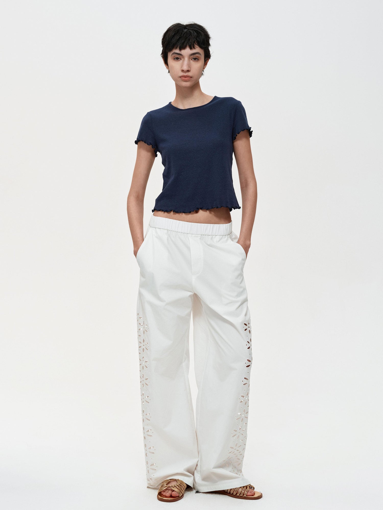 Northbutsouth Laser-Cut Hollow-Out Straight-Leg Pants In Black And White