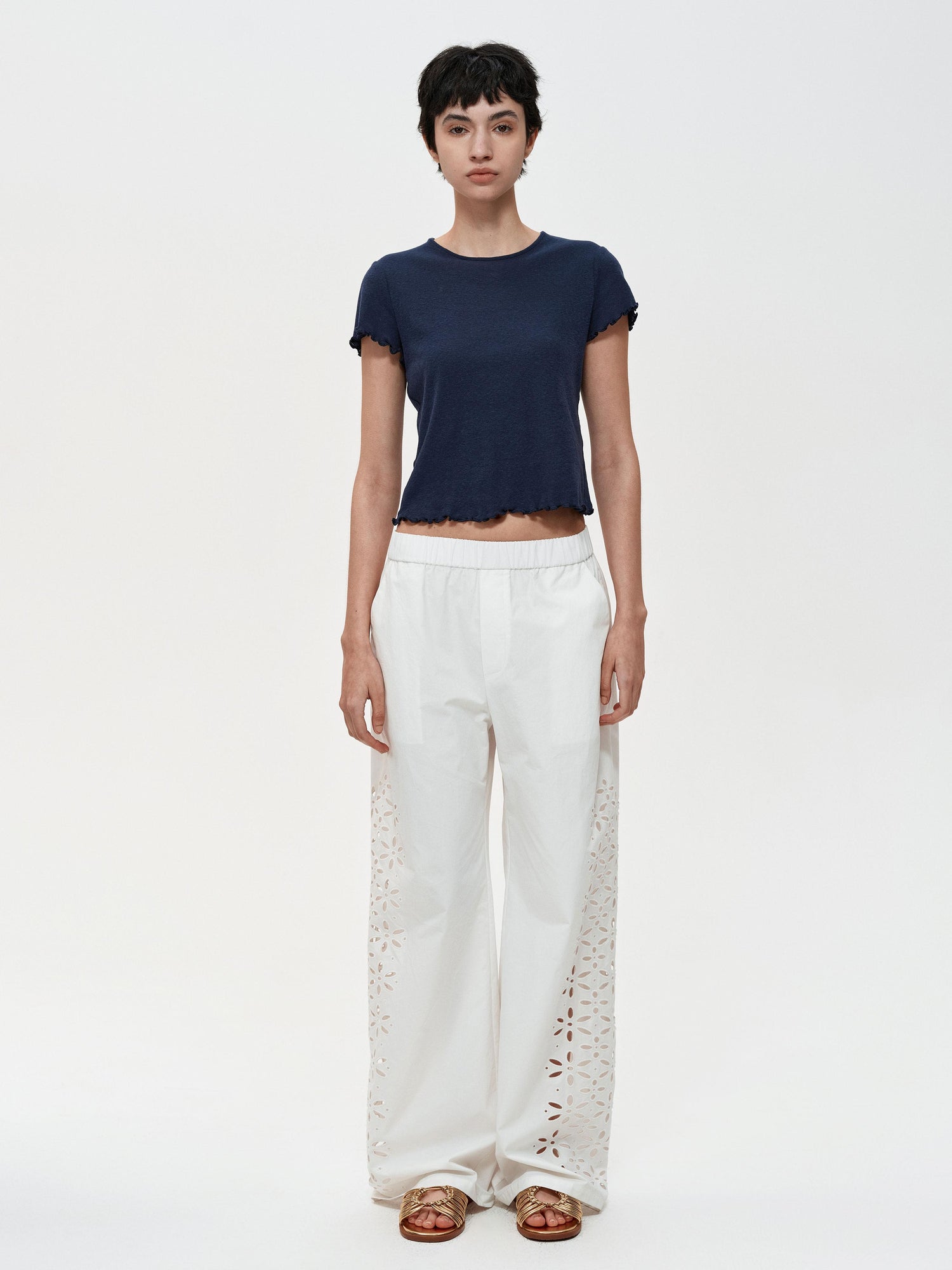 Northbutsouth Laser-Cut Hollow-Out Straight-Leg Pants In Black And White