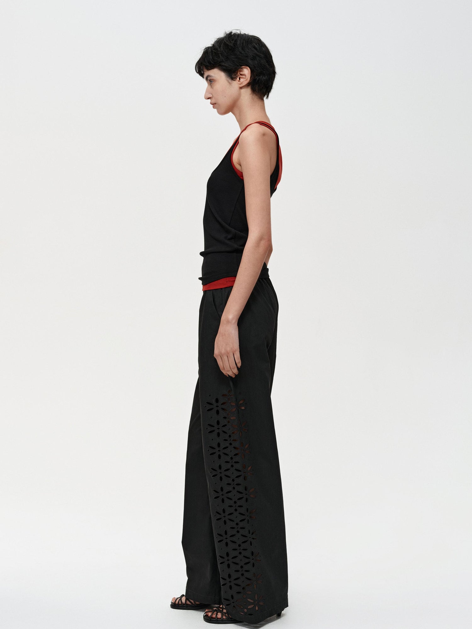 Northbutsouth Laser-Cut Hollow-Out Straight-Leg Pants In Black And White