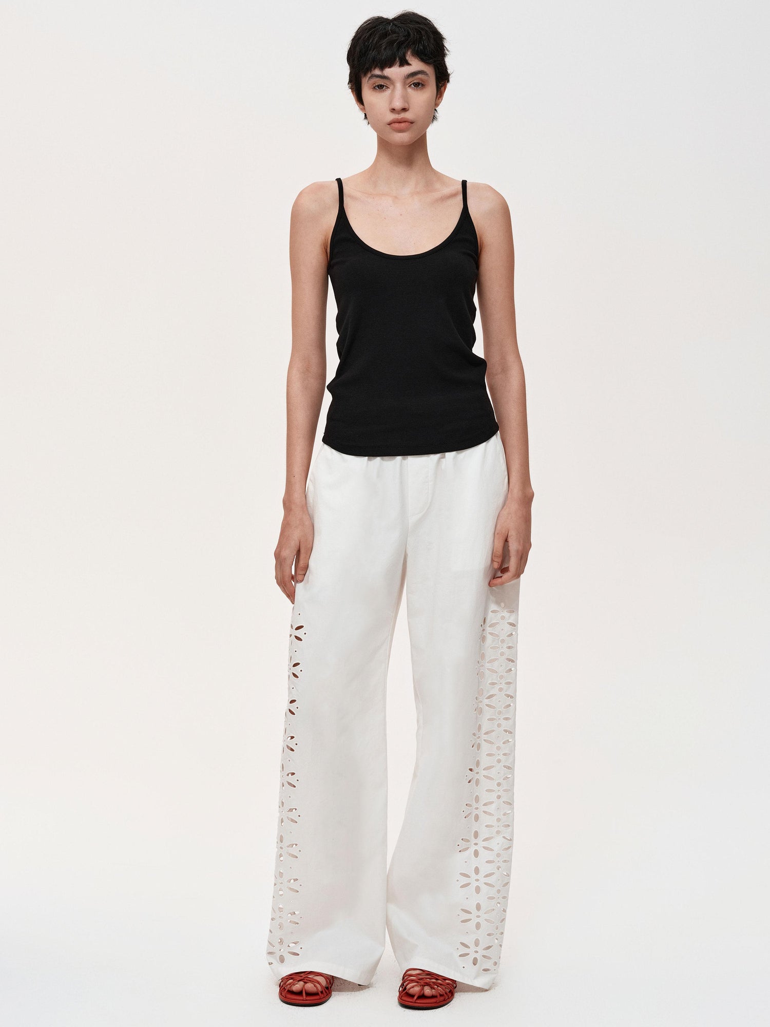 Northbutsouth Laser-Cut Hollow-Out Straight-Leg Pants In Black And White