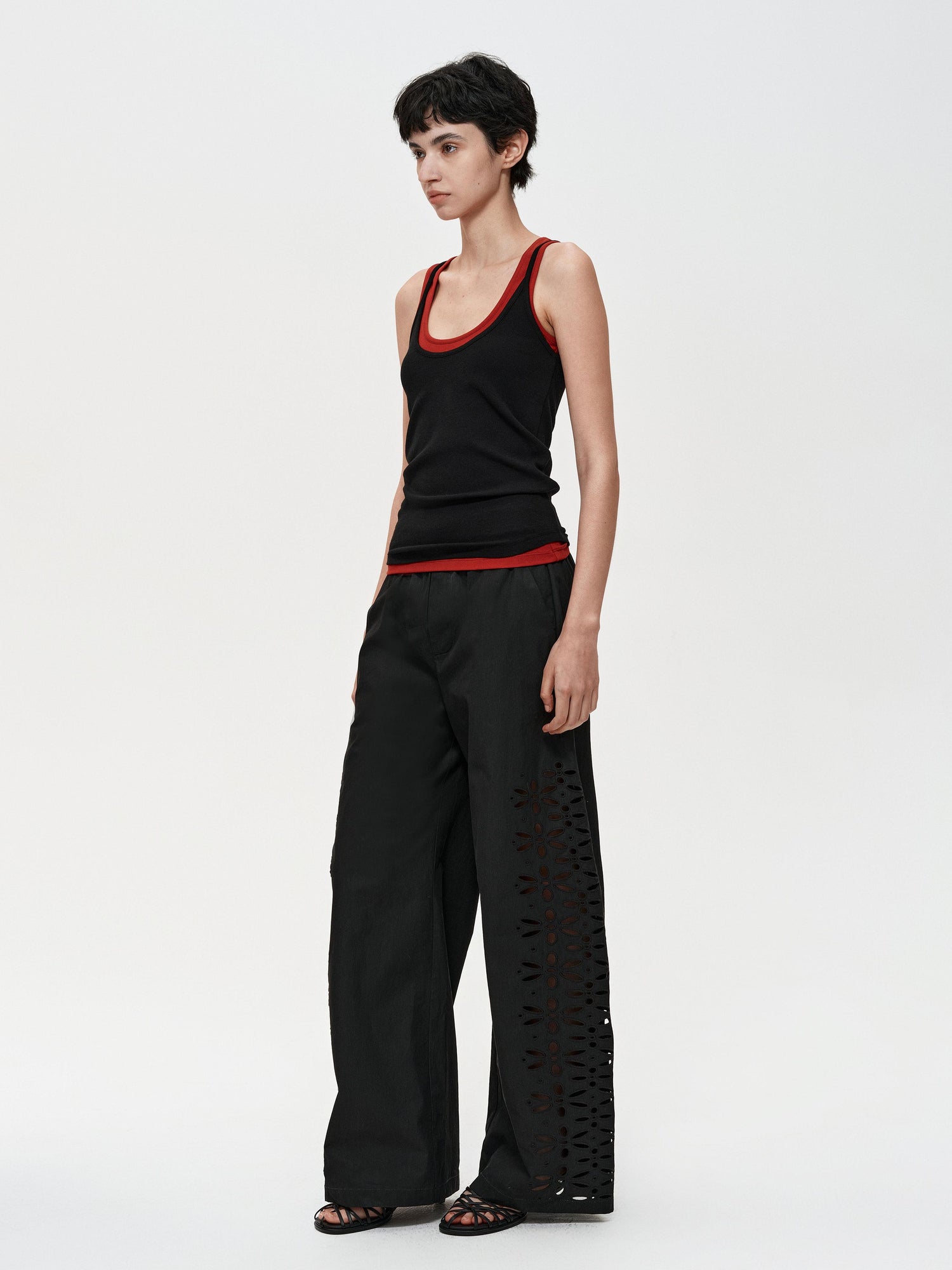 Northbutsouth Laser-Cut Hollow-Out Straight-Leg Pants In Black And White