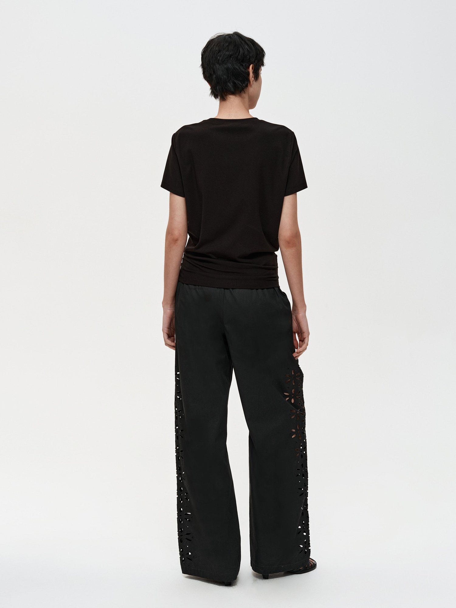 Northbutsouth Laser-Cut Hollow-Out Straight-Leg Pants In Black And White