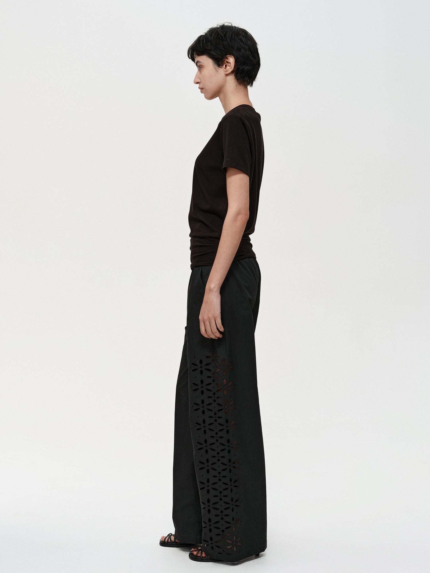 Northbutsouth Laser-Cut Hollow-Out Straight-Leg Pants In Black And White