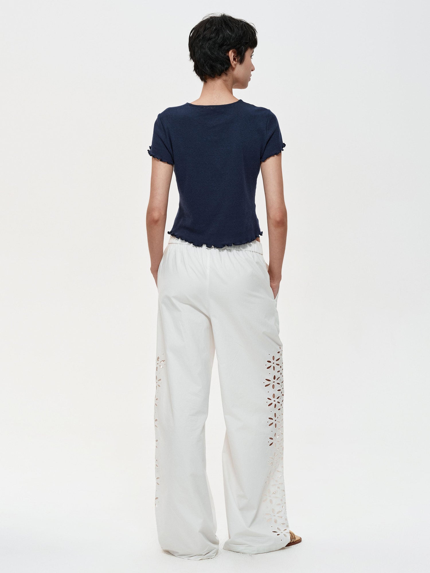 Northbutsouth Laser-Cut Hollow-Out Straight-Leg Pants In Black And White