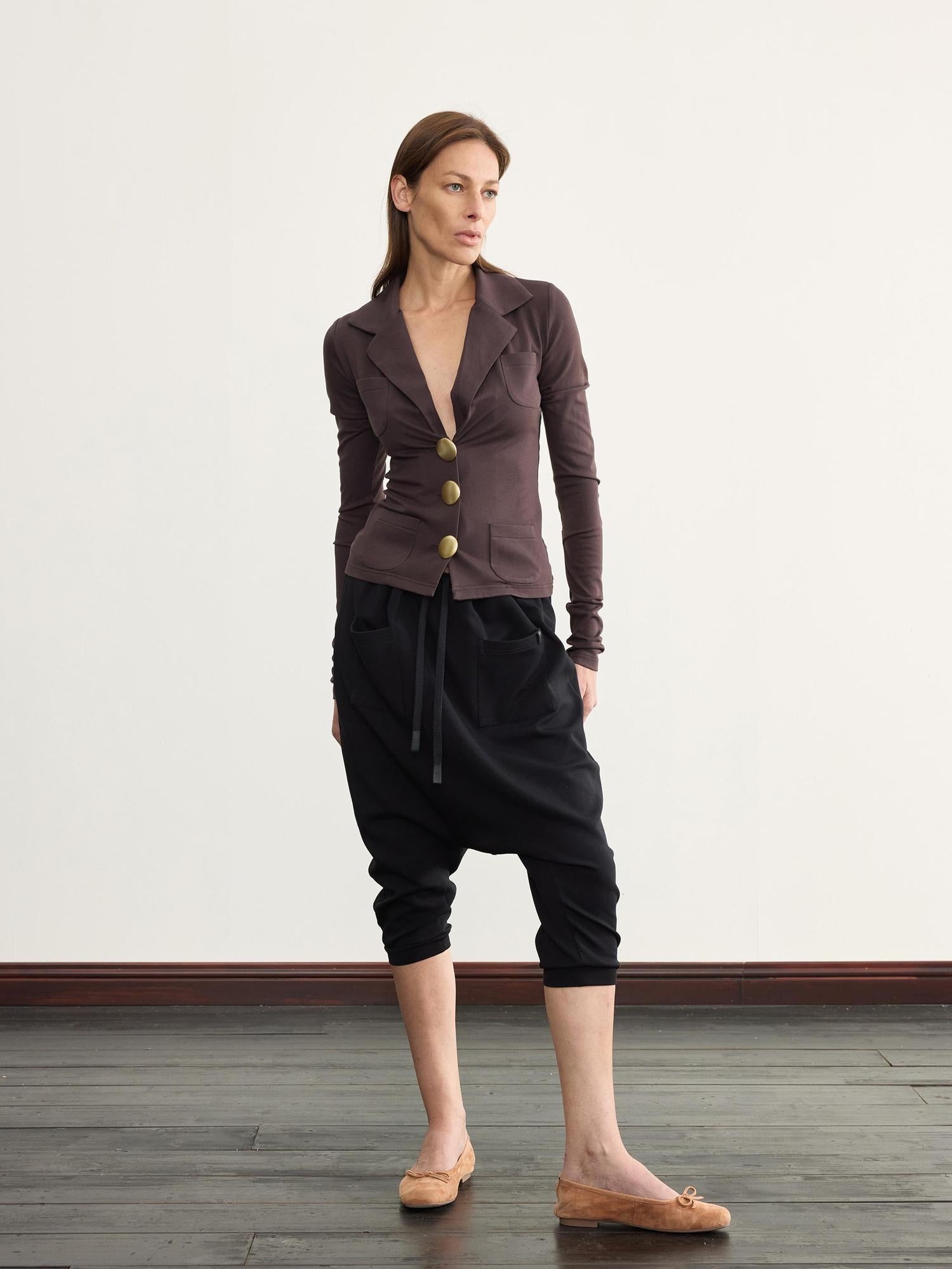 NyDkyel V-Neck Ribbed Modal Knit Top With Gold Buttons And Gathered Cuffs