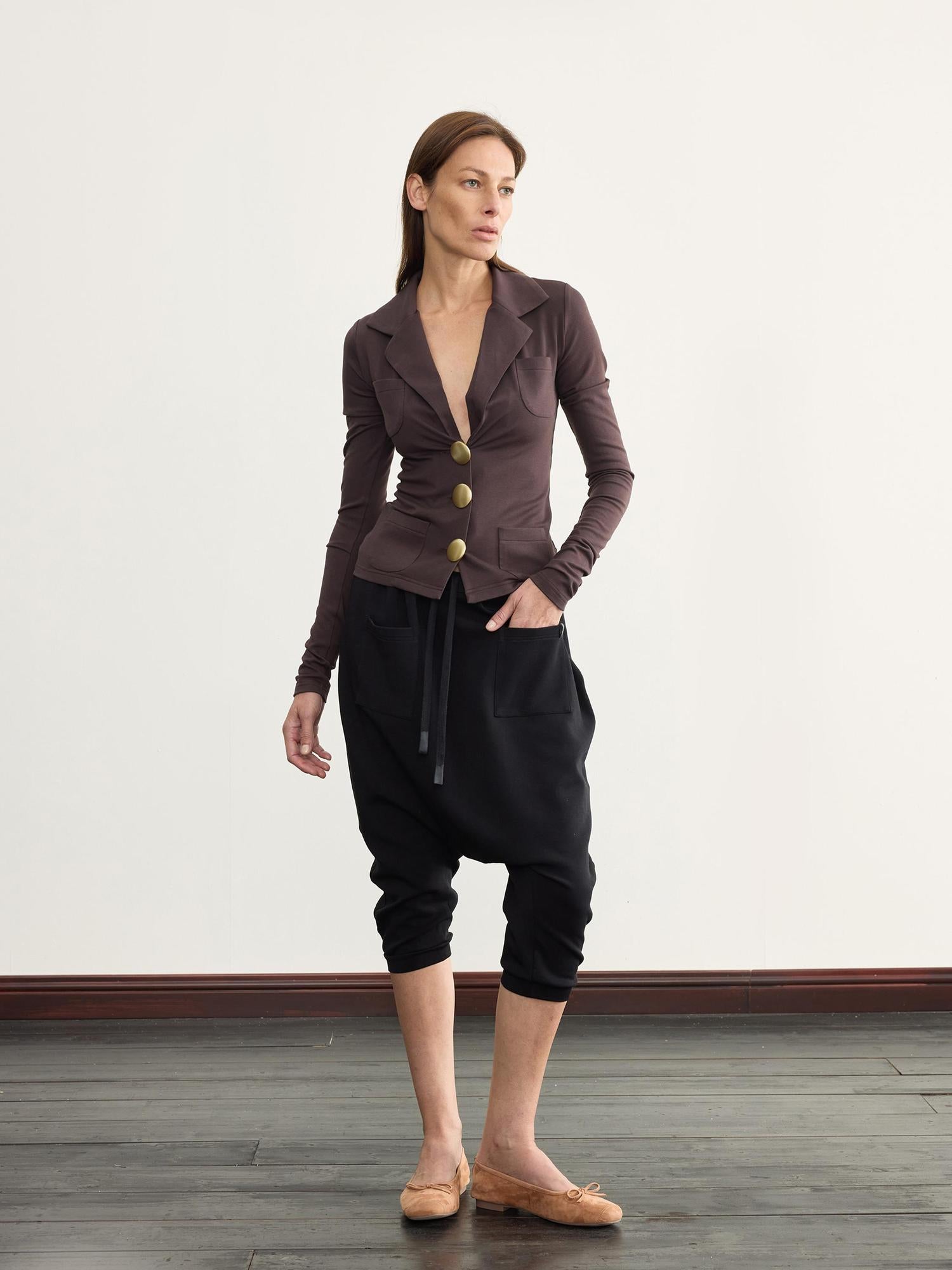 NyDkyel V-Neck Ribbed Modal Knit Top With Gold Buttons And Gathered Cuffs