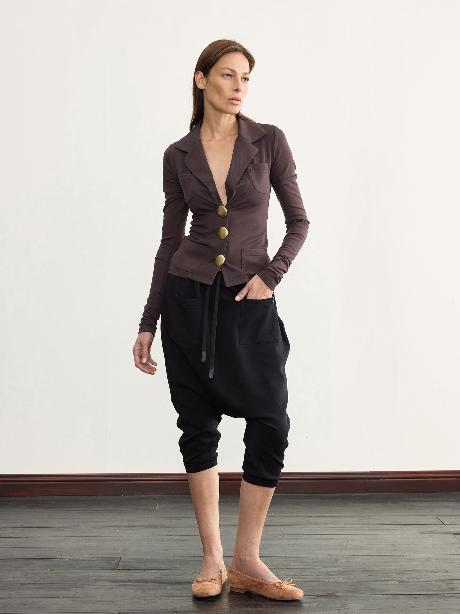 NyDkyel V-Neck Ribbed Modal Knit Top With Gold Buttons And Gathered Cuffs