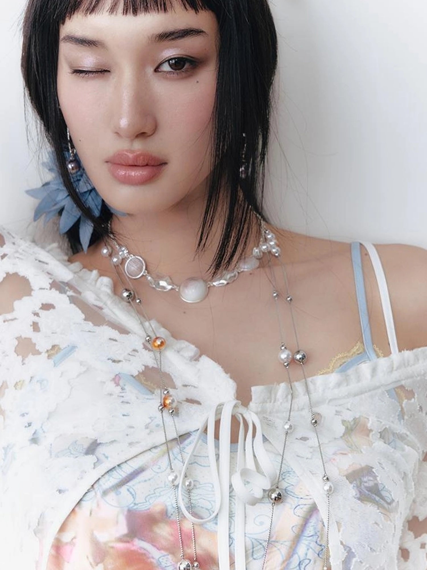 OfAkiva V-Neck Lace-Up Bell Sleeve Blouse