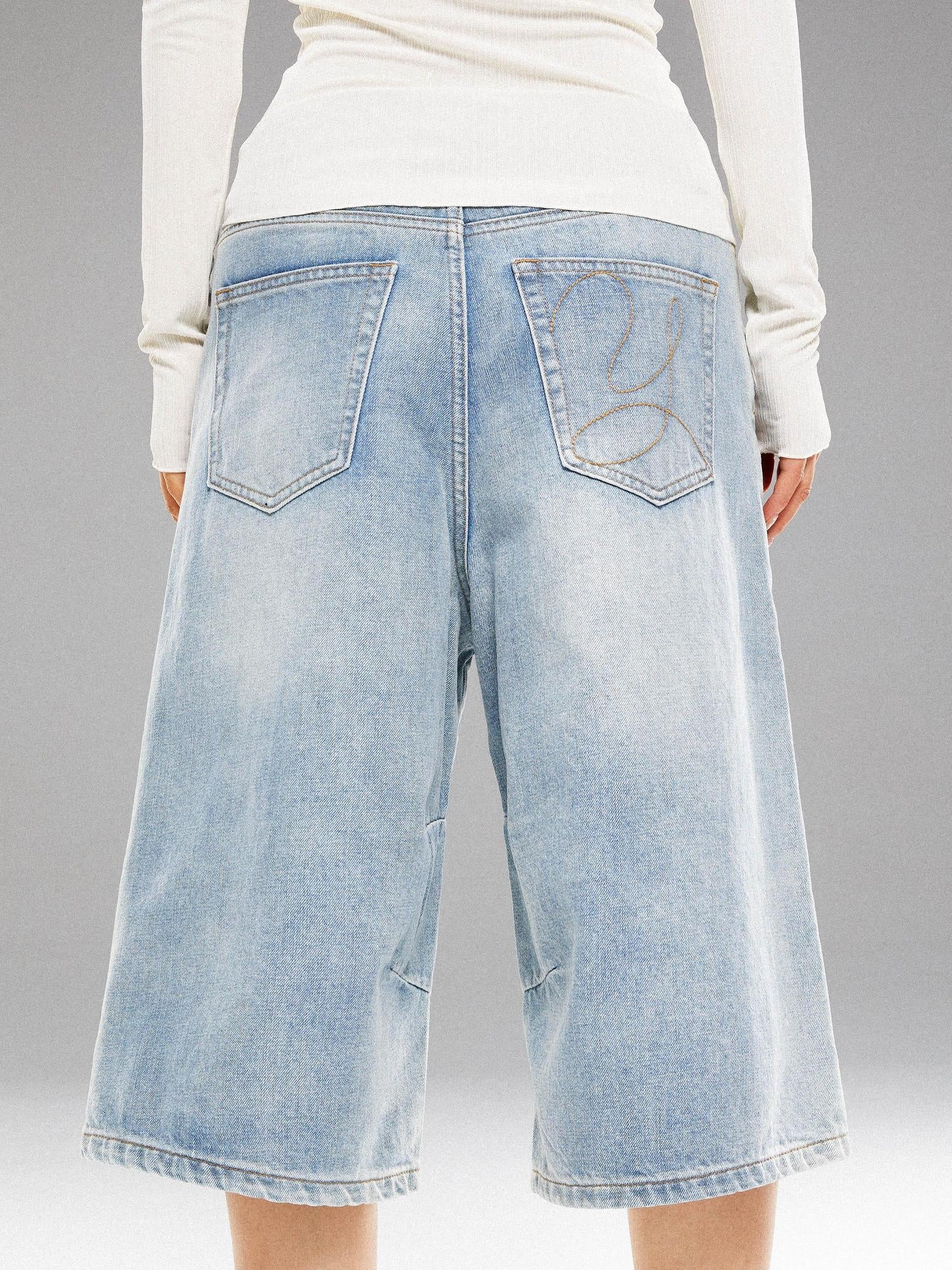 YOSHUYUKI Washed Blue Denim Mid Shorts With Metal Rivets
