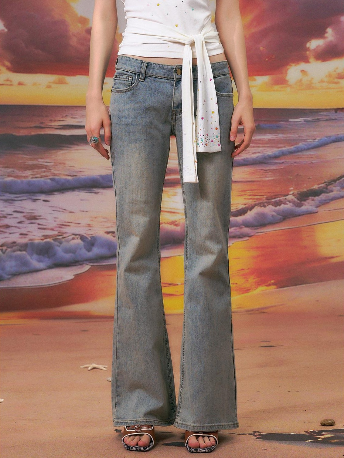 The NeverMore Durable Distressed Relaxed Low Rise Light Blue Denim Women Straight Leg Jeans