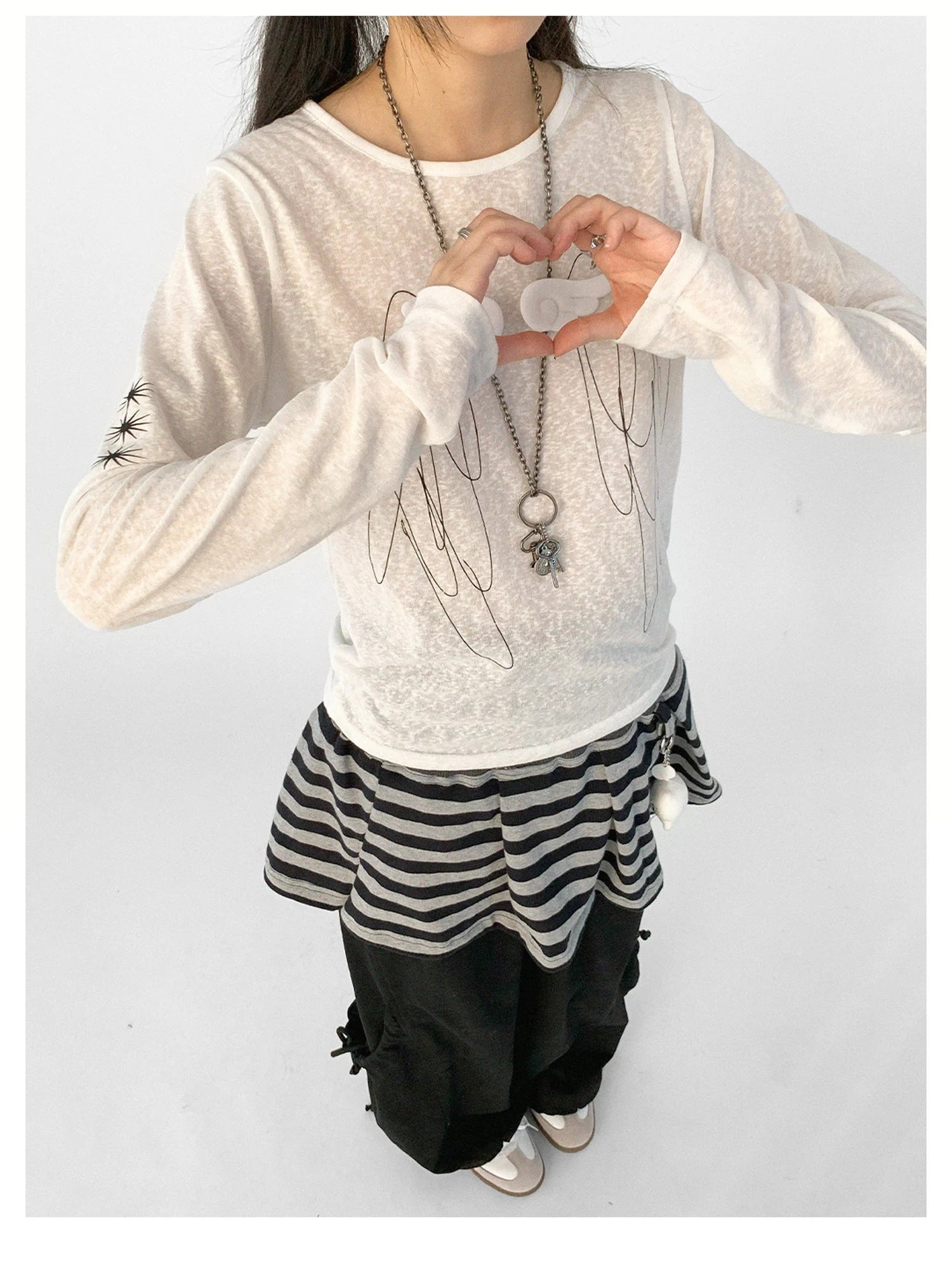 Striped Pleated Knit Miniskirt with Ribbed Waist