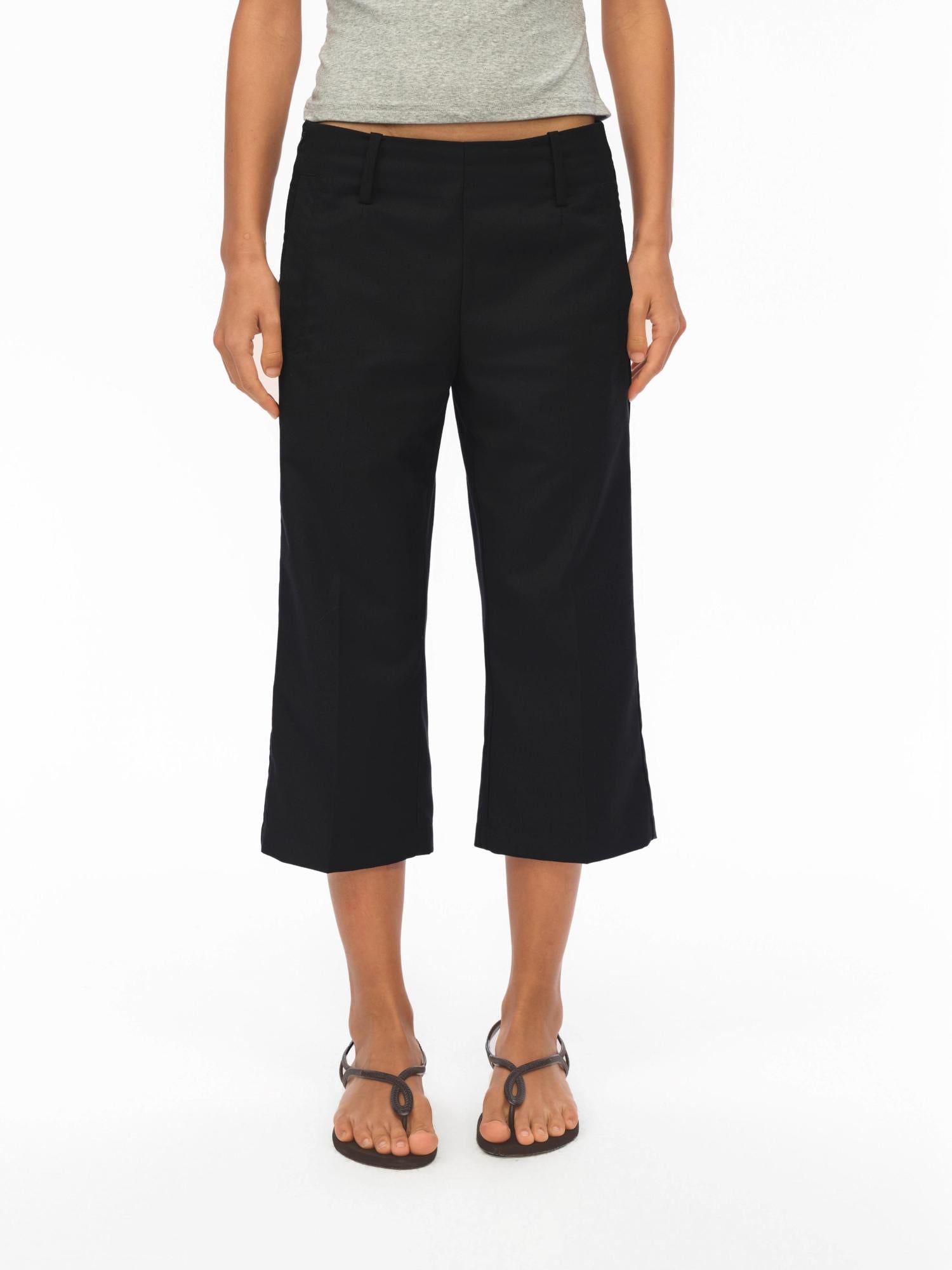 oinimi Low Rise 7 8 Flared Trousers In Slimming Black