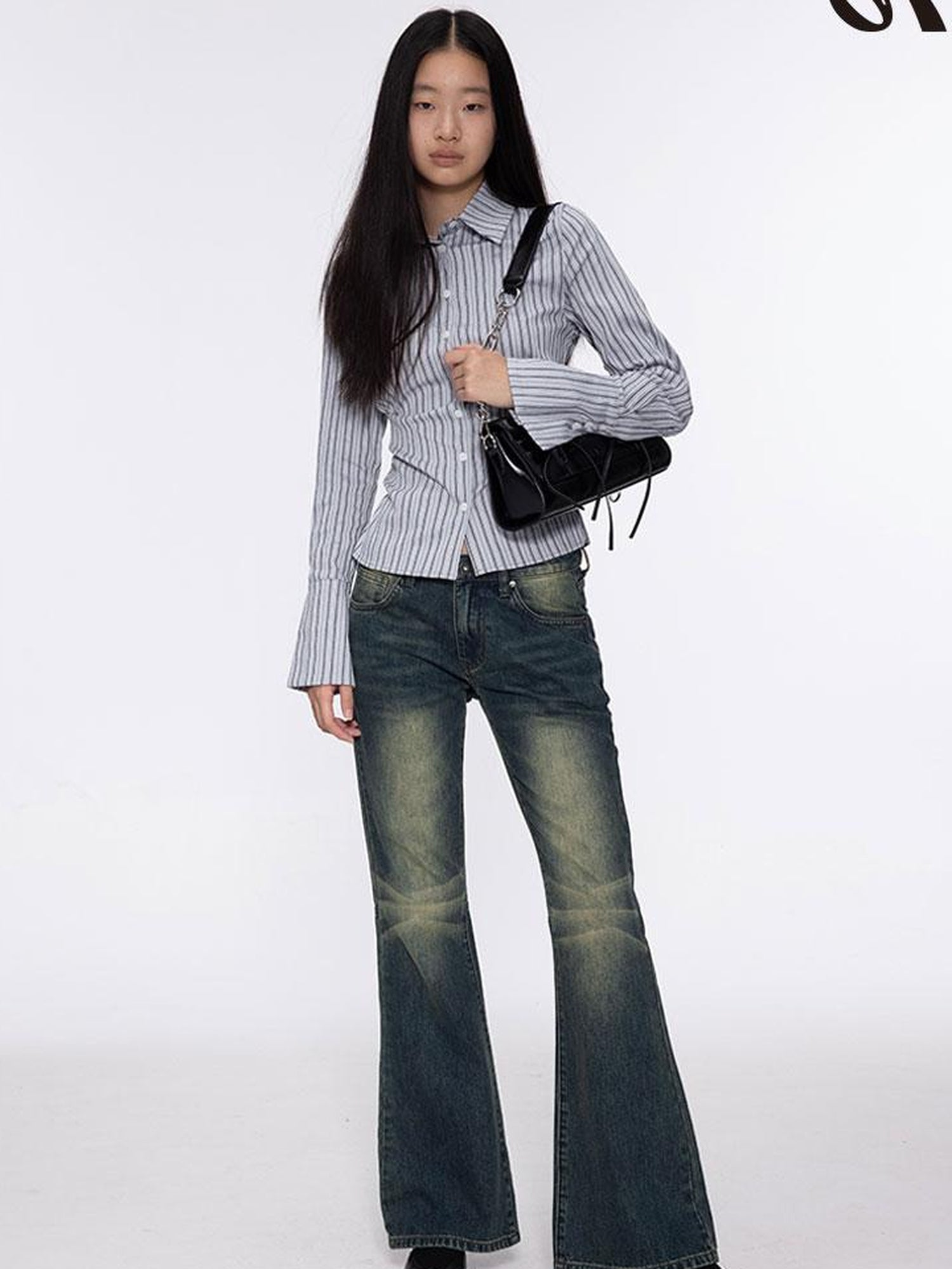 oinimi Low Rise Flared Jeans With Stacked Hem